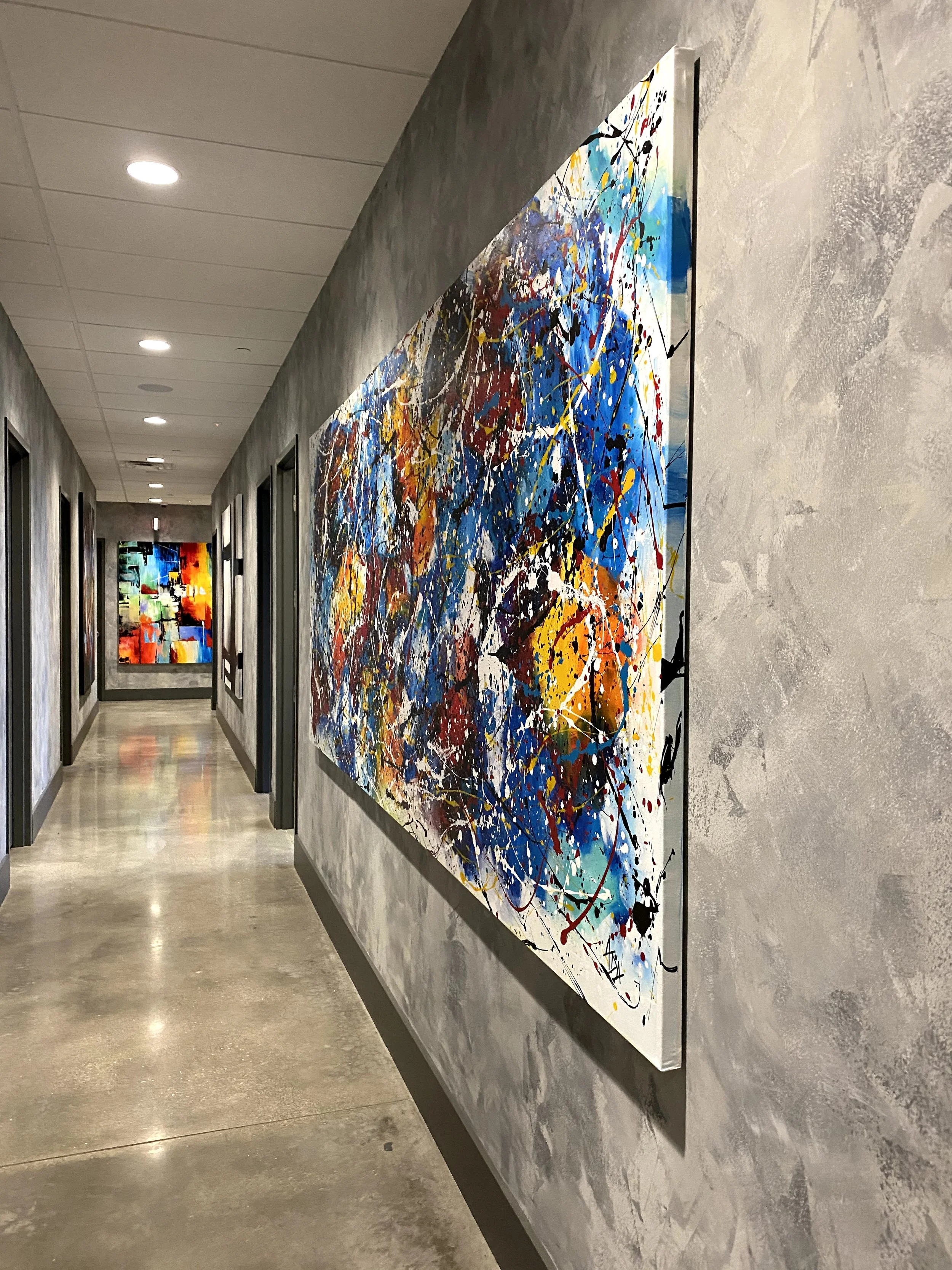 Original colorful abstract paintings displayed in a contemporary interior, showcasing large-scale modern artwork by Modern Art Home Decor.