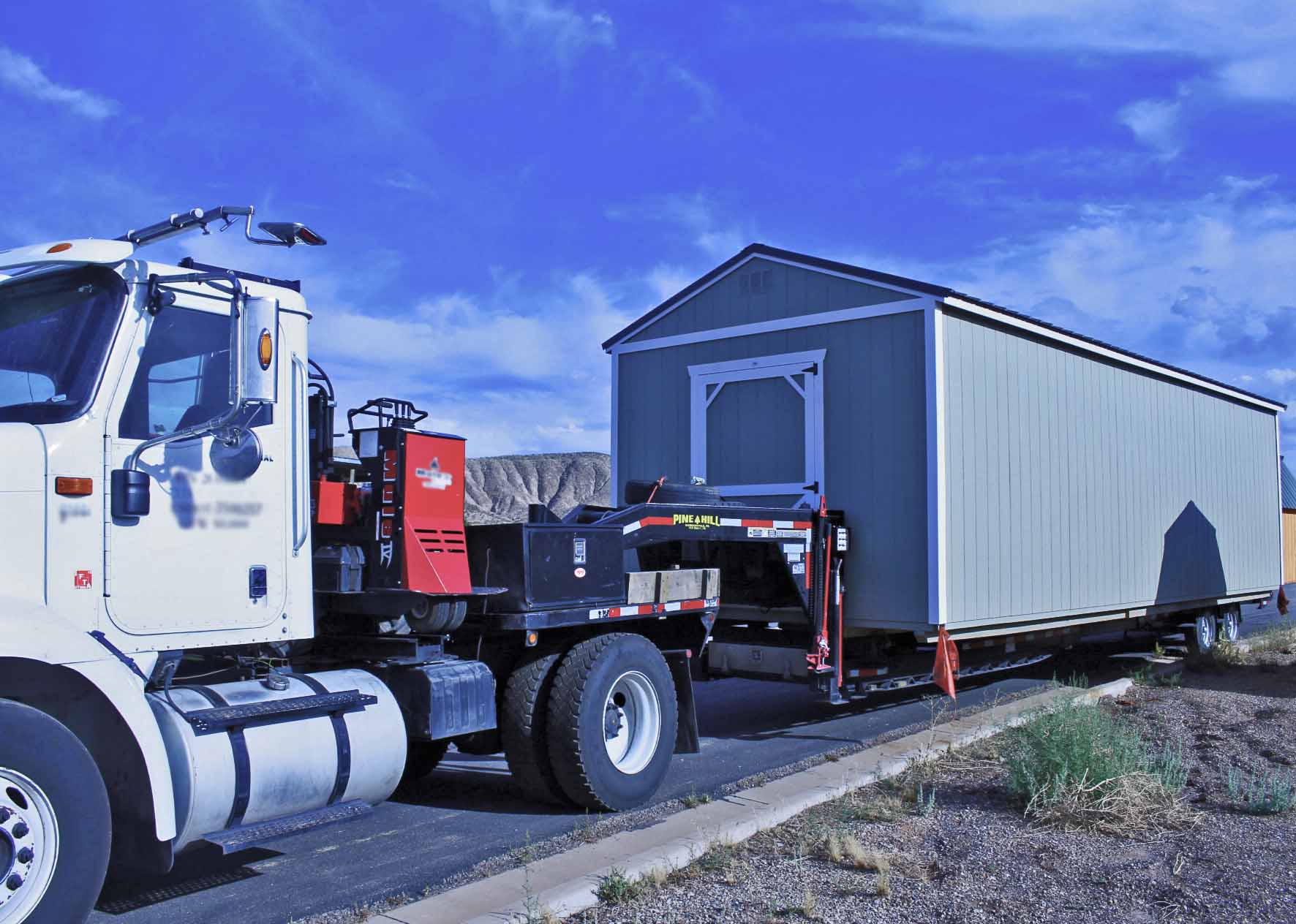 Painted wood shed ready for delivery