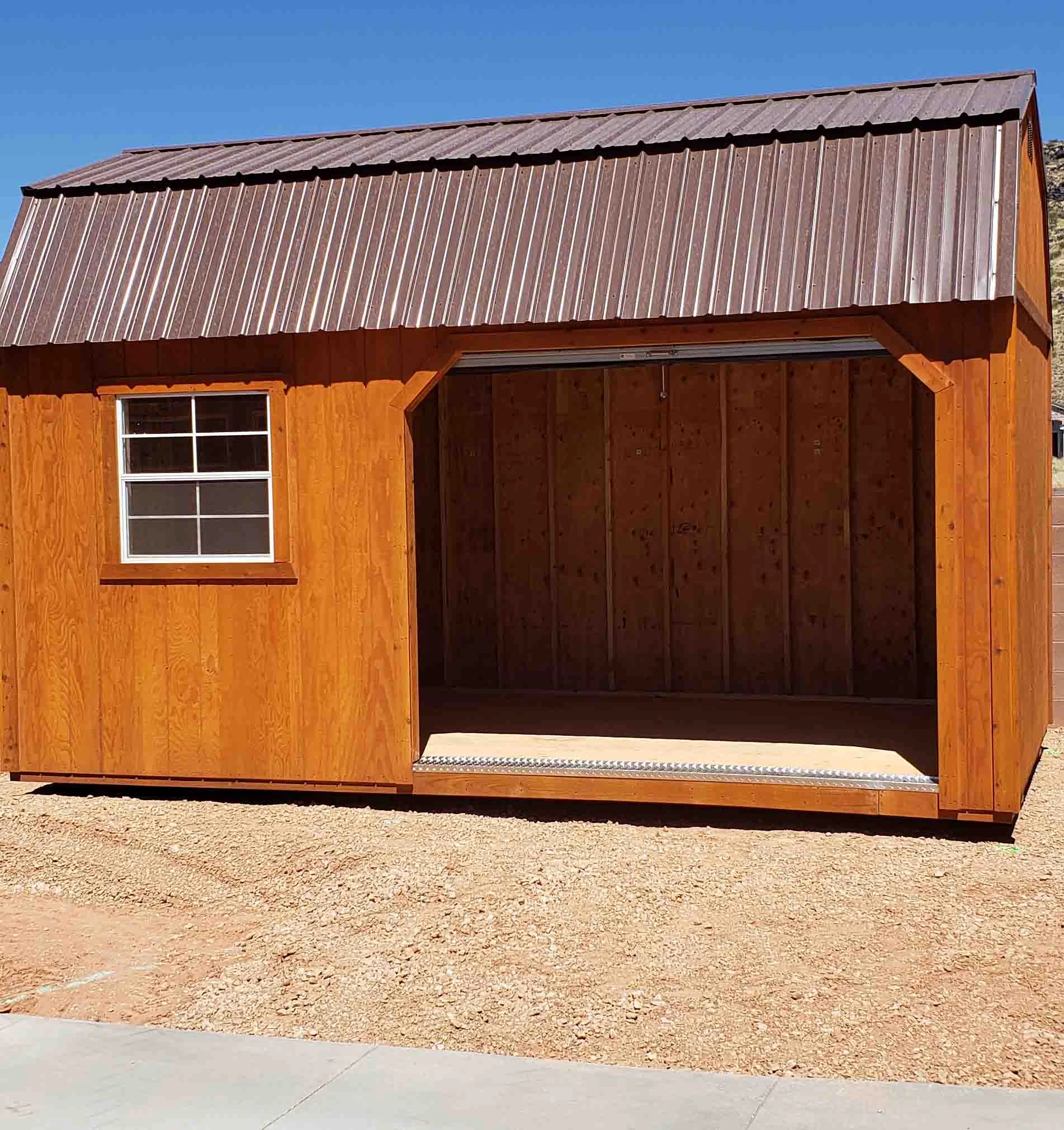 Side Lofted Barn with Garage door on the Side