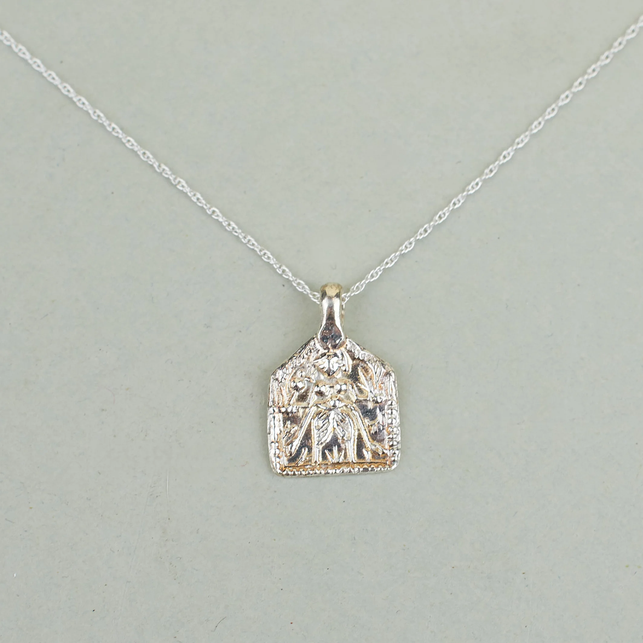 A NEW TRIBE NAGLE & SISTERS SHIVA AMULET NECKLACE SILVER 01 CROPPED.jpg