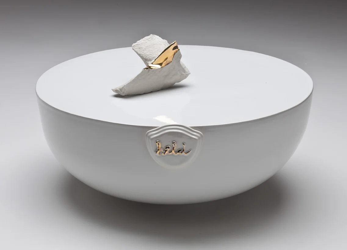 held slipcast vitreous ceramics with glaze and gold luster, 12"x21"x21", 2011