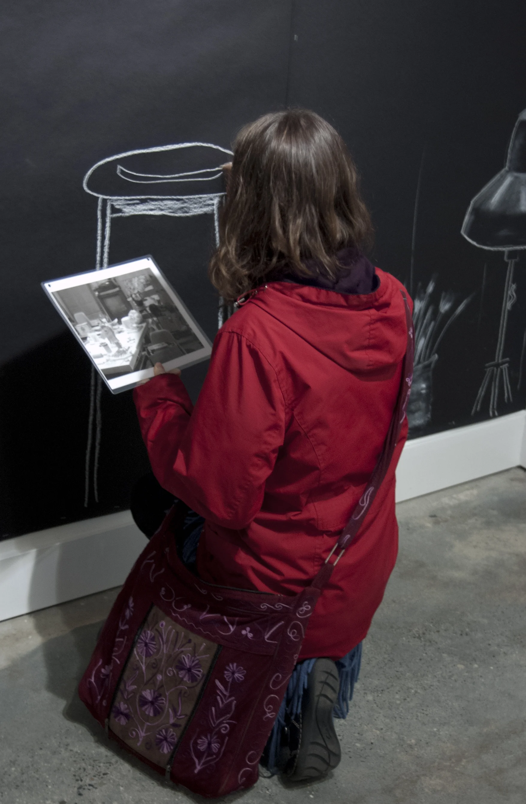 parlor games: parallax (participant drawing on the wall)