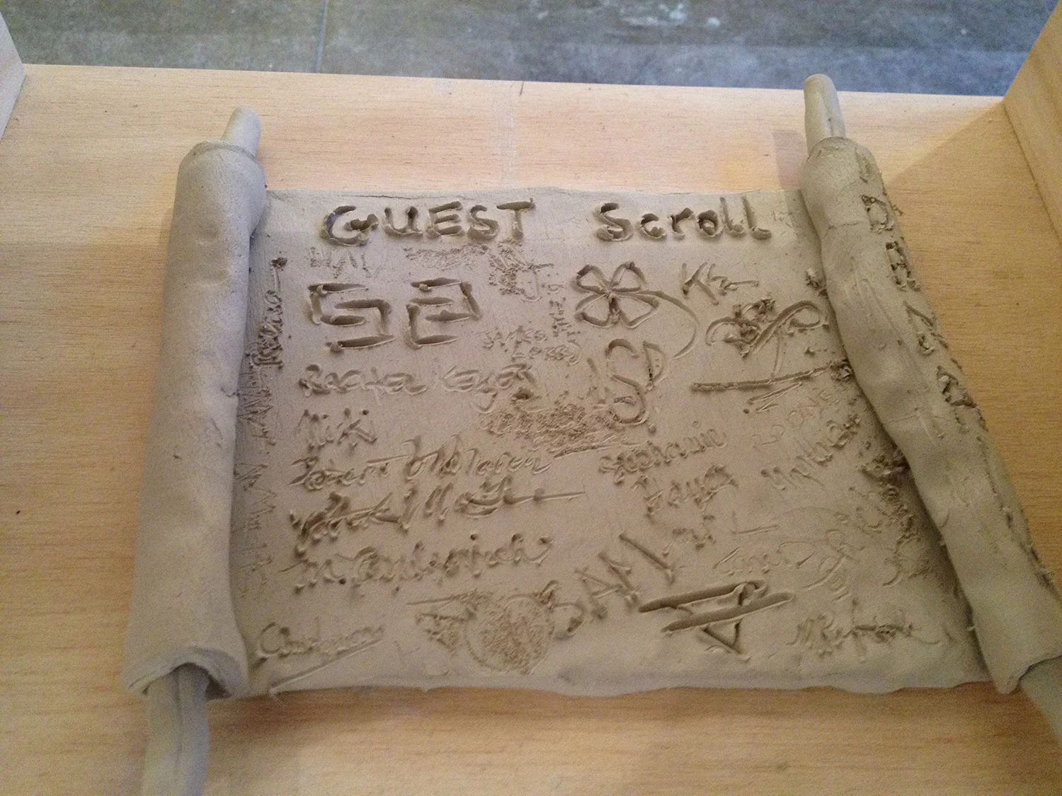 open for construction (clay guest scroll)