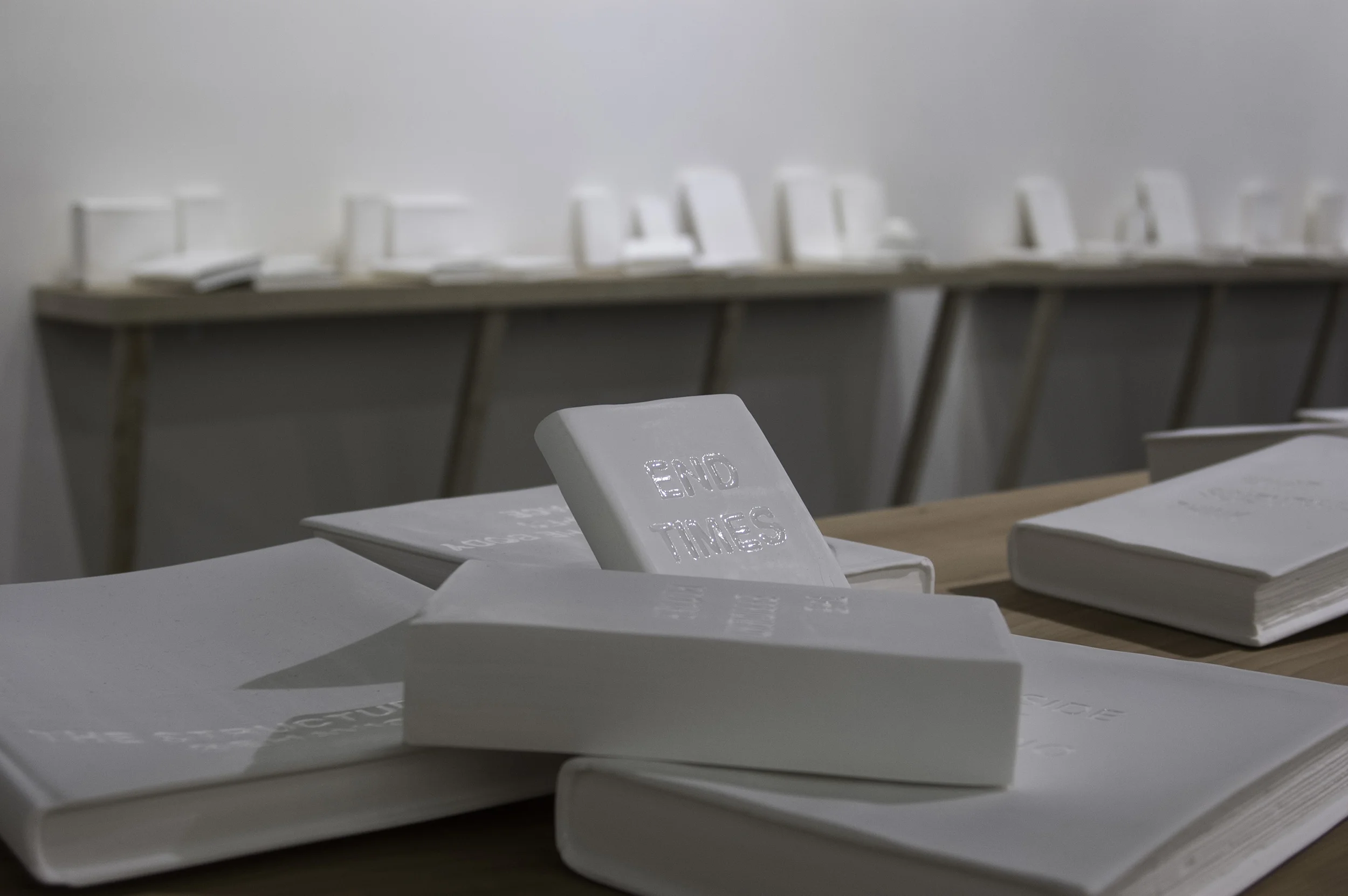parlor games: scientia (detail: scientia library) slipcast, carved bone china with glaze