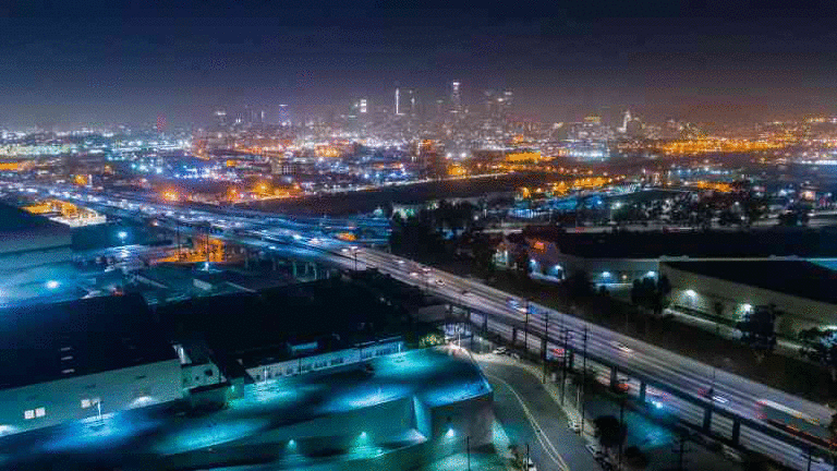 los-angeles-drone-time-lapse-of-urban-freeway-and-city-skyline-with-traffic-at-nigh-SBV-320019772-4K(1).gif