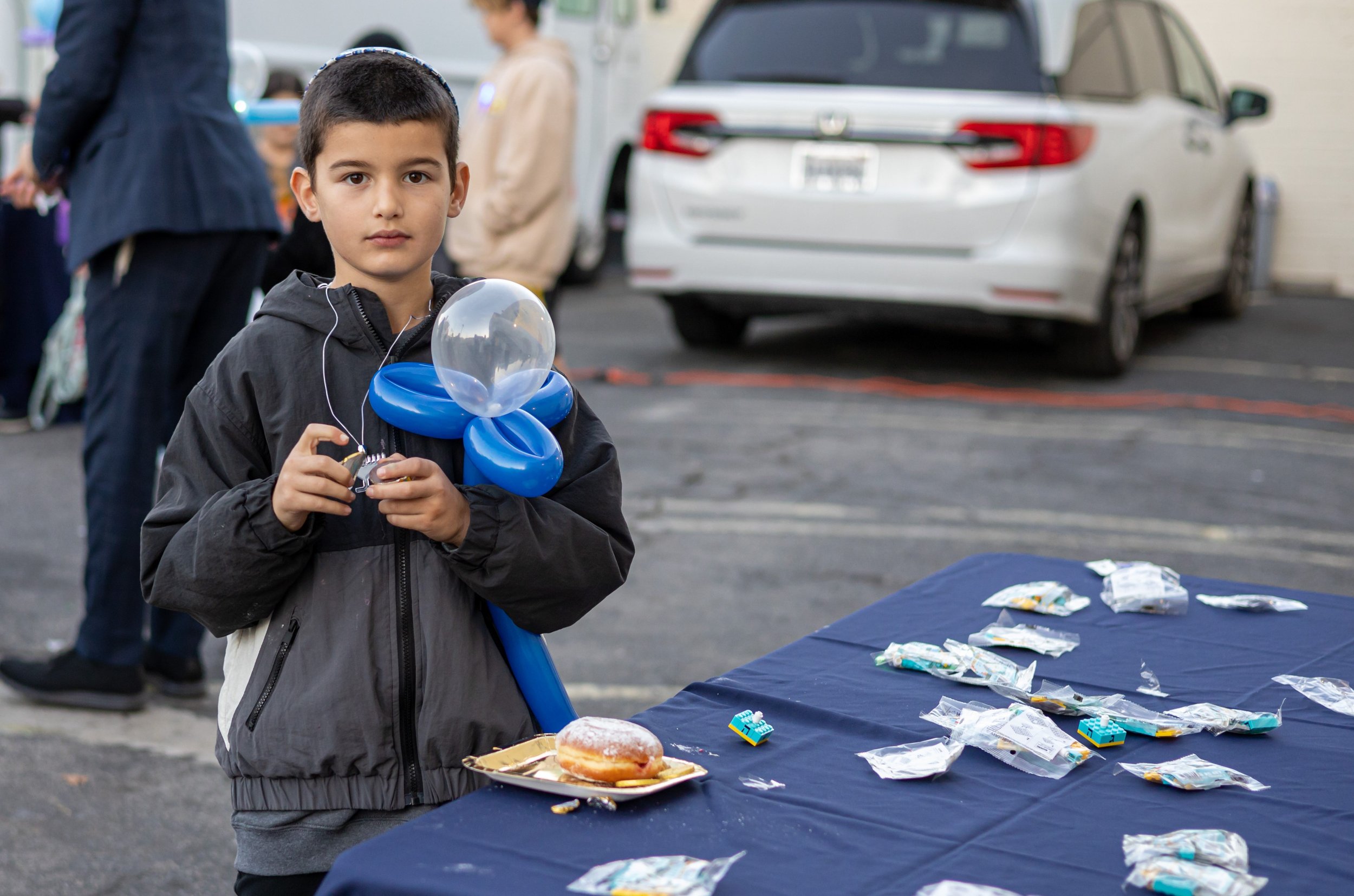 Chanukah Lighting Candles At Melrose LA 2022-12.jpg