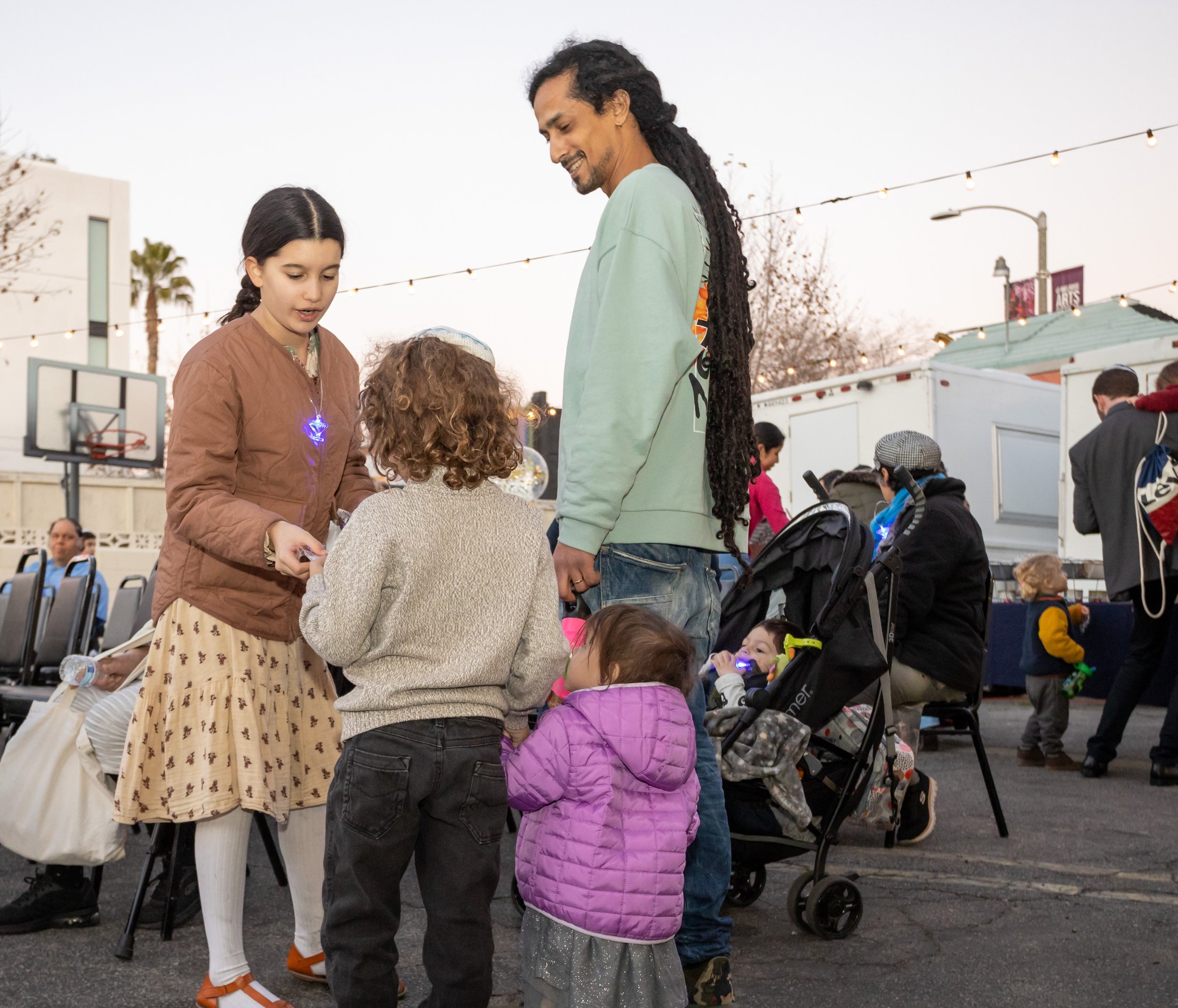 Chanukah Lighting Candles At Melrose LA 2022-25.jpg