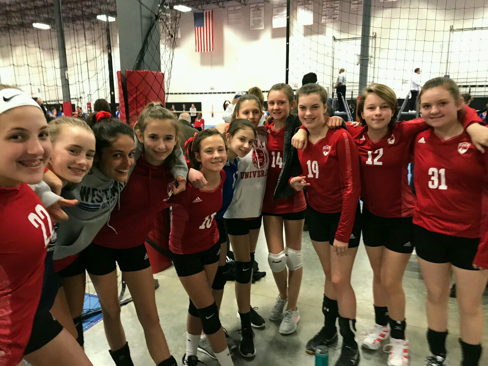 13 Red arm in arm at tournament.jpeg