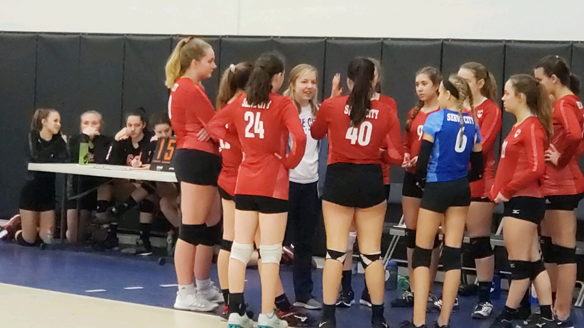 15 Red huddle.jpeg