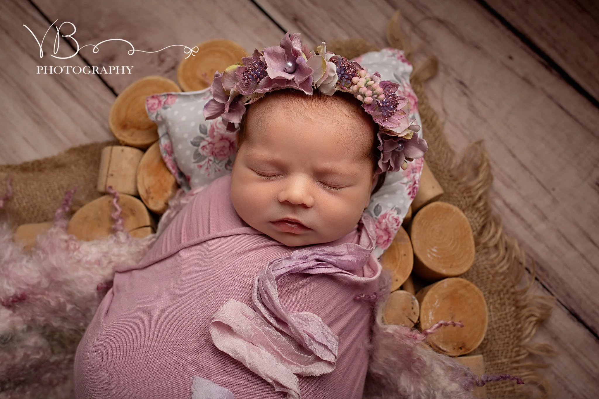 Studio newborn photography session in Colchester, baby girl newborn session with beautiful floral styling
