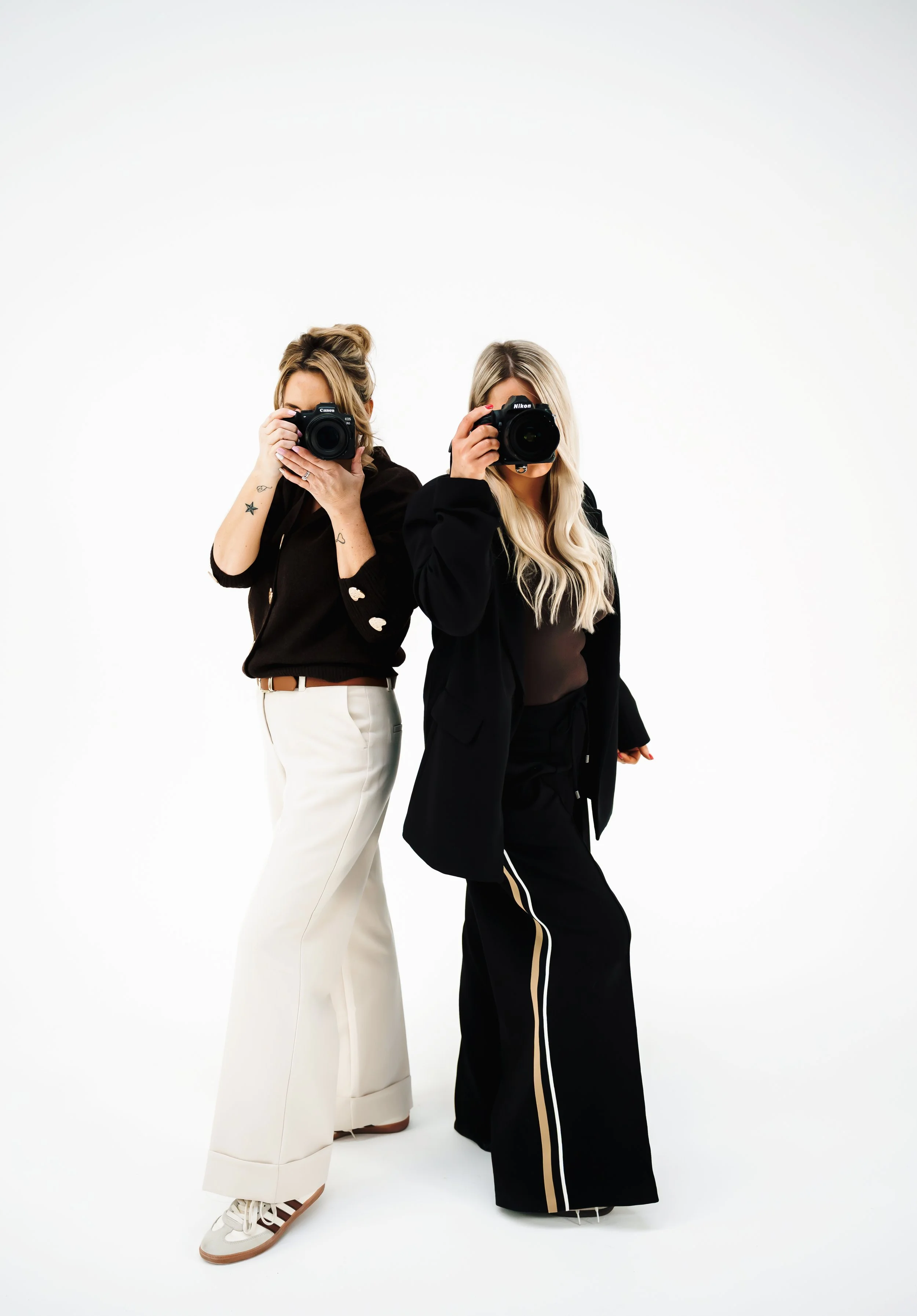 photographers with cameras Dani Rose Photography and Sandie Ritchie Photography