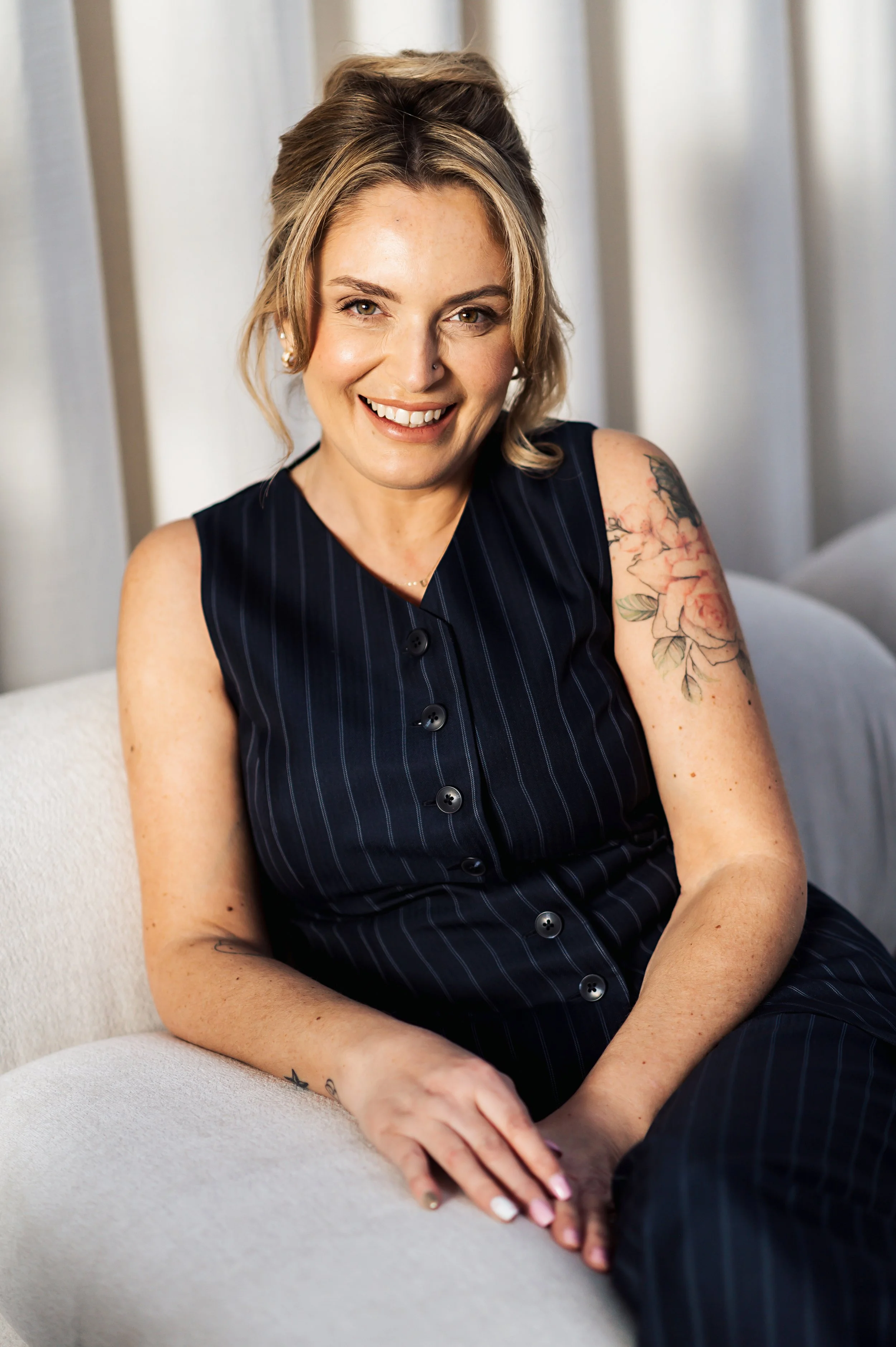 Aberdeen wedding photographer Dani Rose Photography sitting in a chair