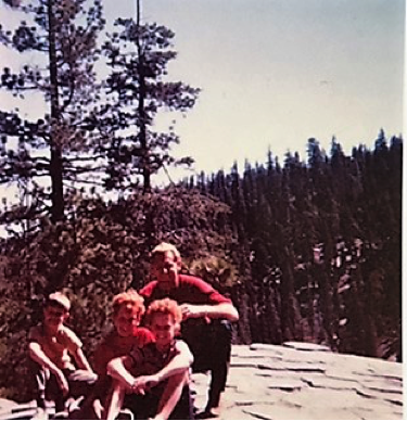 That’s me down in front at about 8 years old. :) Back row, left to right: brother Hoag, sister Andrea, and my Dad