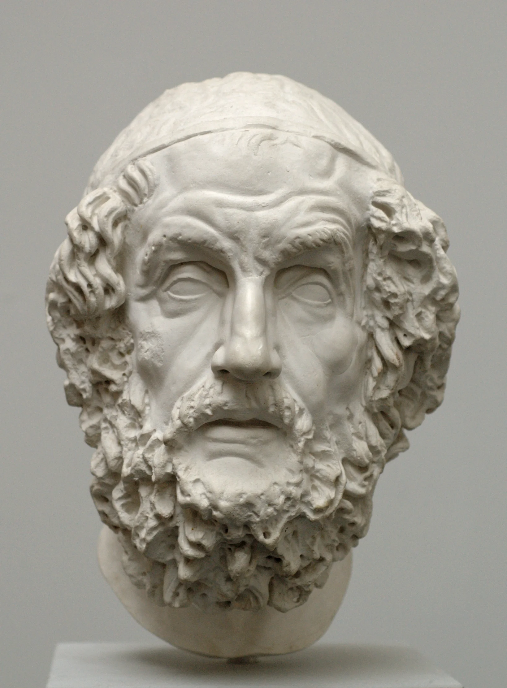 Bust of Homer, Hellenistic period. Modern copy after an original in the National Archaeological Museum of Naples. Photograph by Bibi Saint-Pol, 2007. Public domain via Wikimedia Commons .