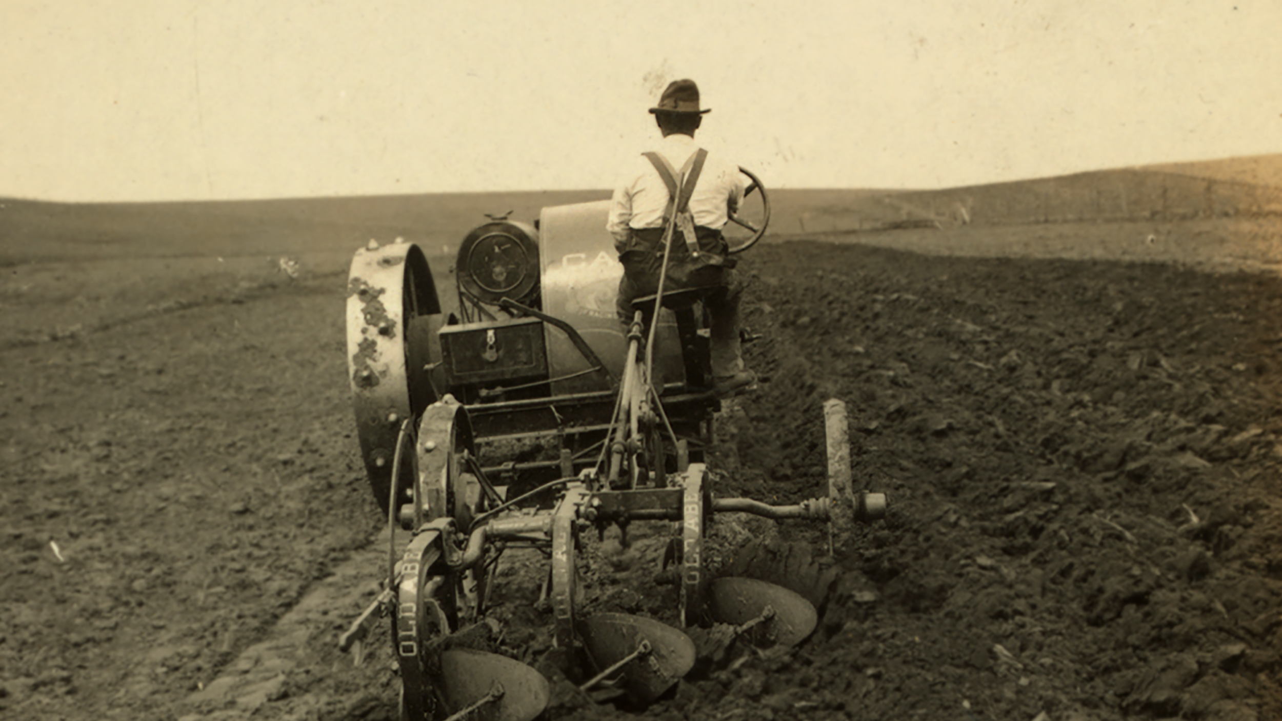 Plowing rich prairie soil with tractor, S. Dak 16-9.png
