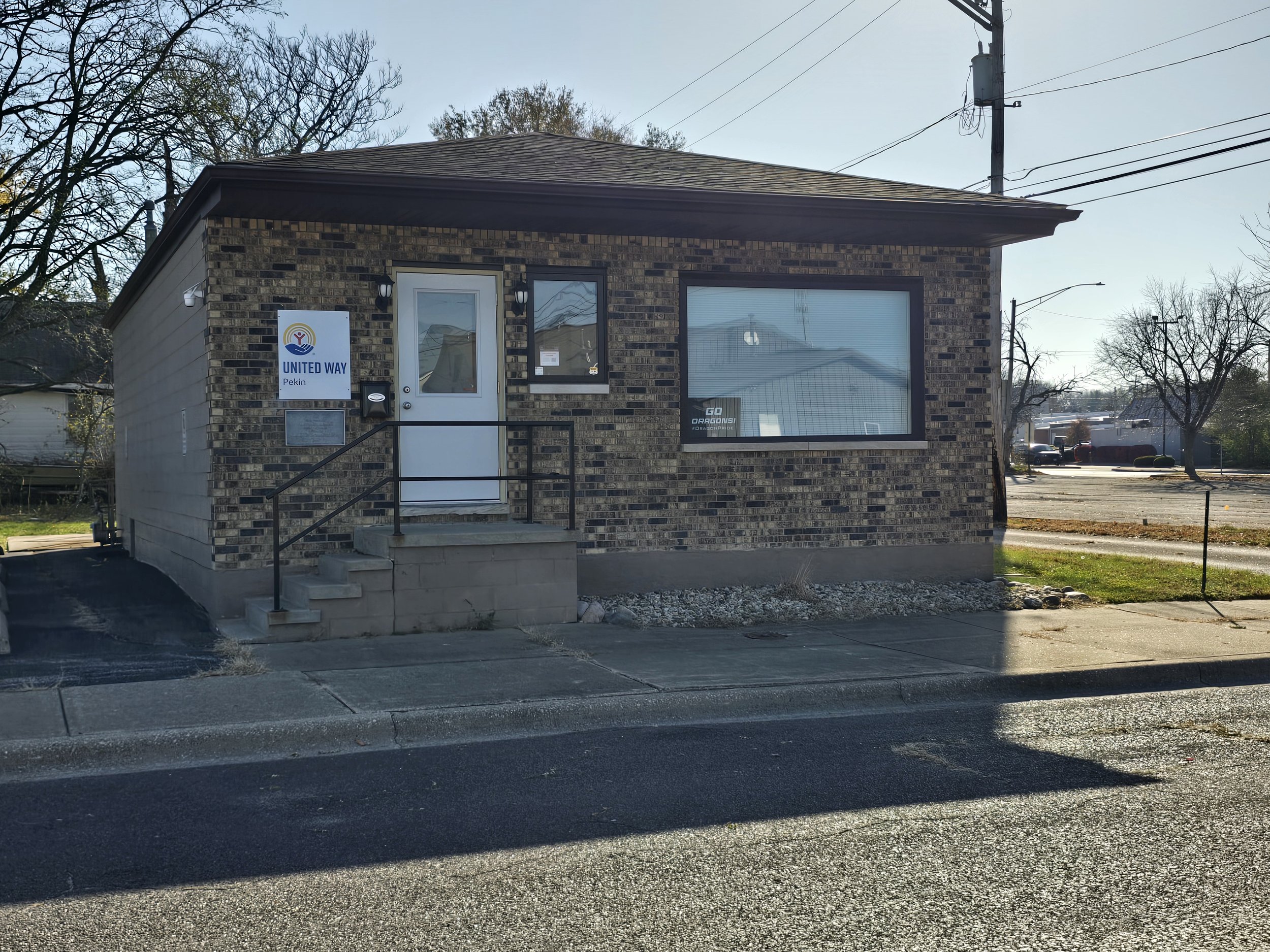 Same building, new door and sign!