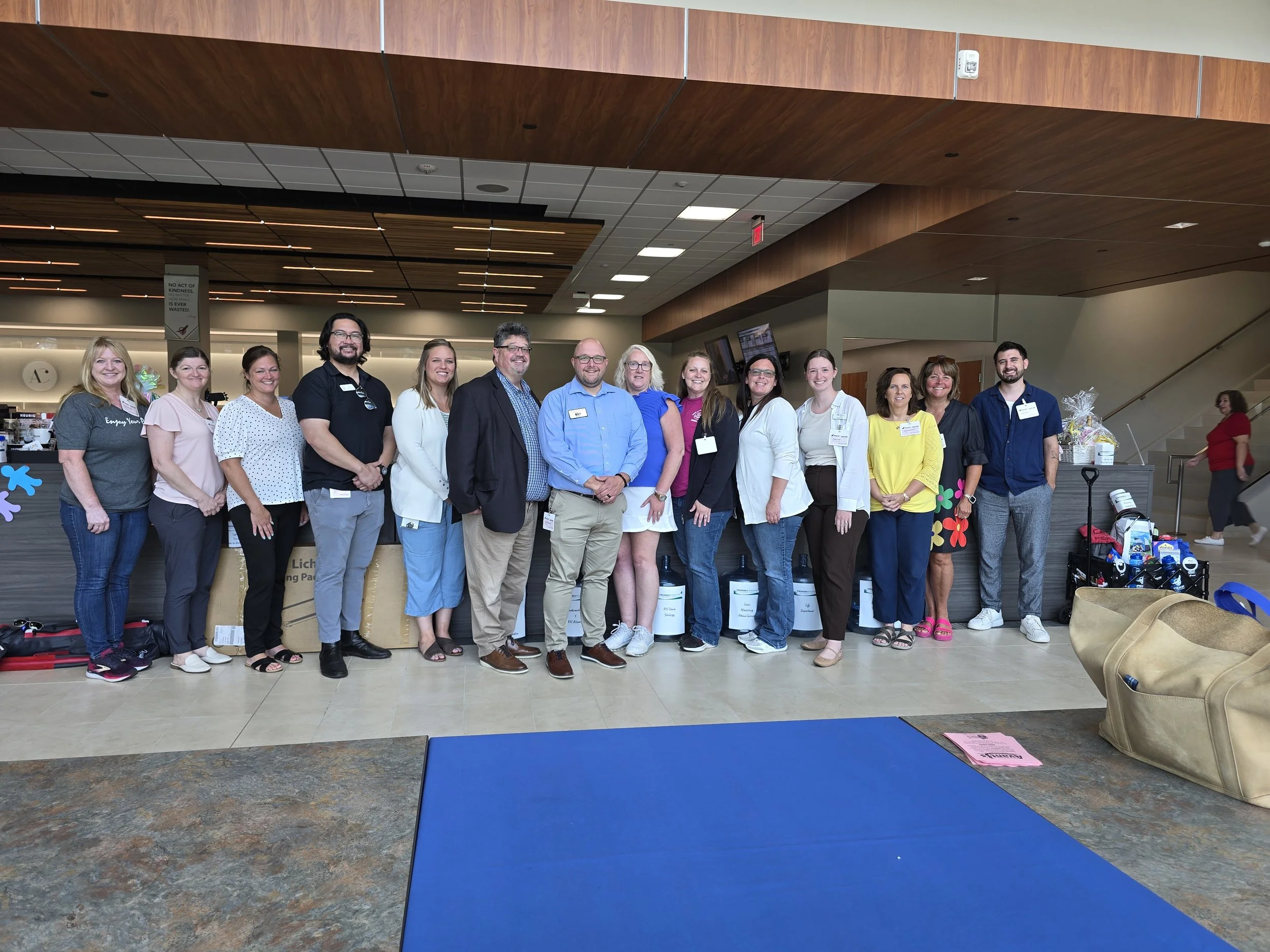 Executive Director, Keith McKeever with Pekin Insurance Campaign Chair Vanessa Henderson and partner agency representatives at the 2025 Pekin Insurance Campaign.