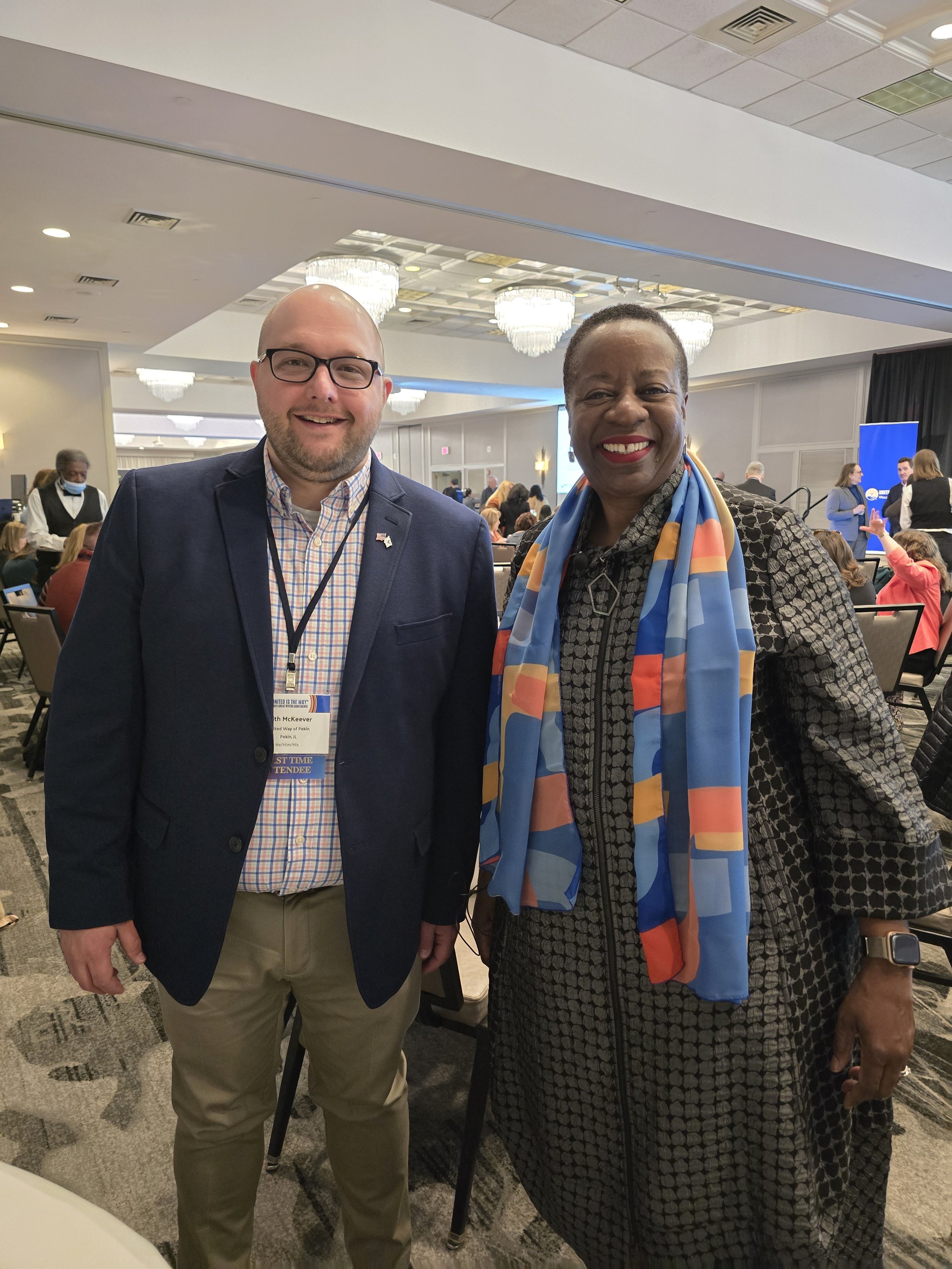 Executive Director Keith McKeever with United Way Worldwide CEO Angela Williams at the Great Rivers Conference in 2025.