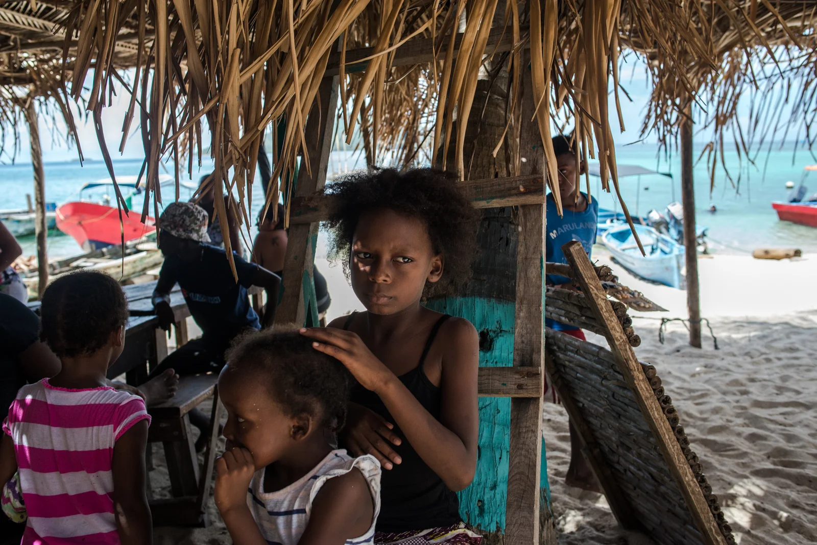 A young girl on Cayo Chachahuate, a tiny island highly populated by Garifuna peoples. The Garifunas are a small race of indigenous people with a long and complicated history. An ethnic mix of Island Carib (Taínos, Arawak, and Carib) with a group of (purportedly shipwrecked) African slaves that lived on St. Vincent. They were exiled to Honduras in 1796 by the British.