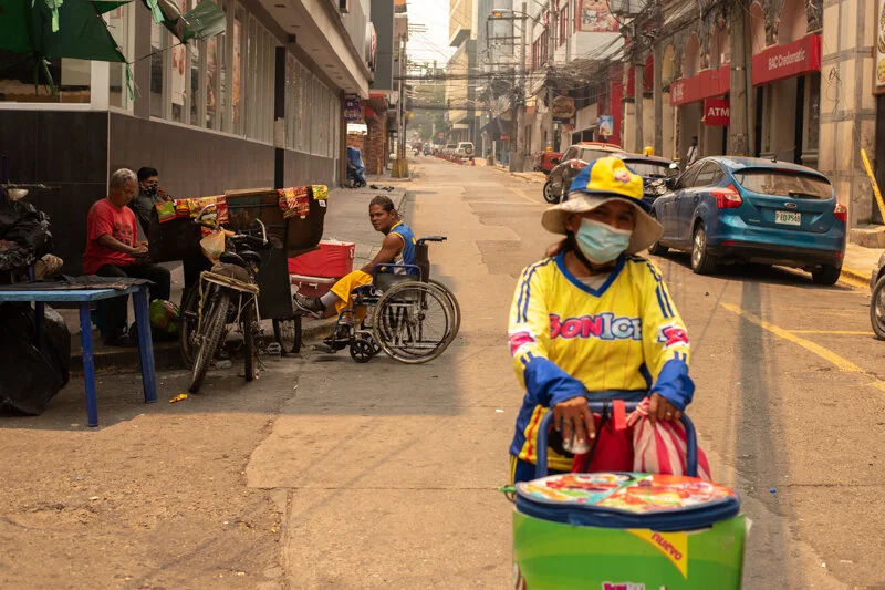  The country's most vulnerable, the people who live on the fringes, the over 60% that live in poverty in Honduras are existing in a sort of limbo—still on the streets trying to get by as they normally would, despite the fact that the corridors they o