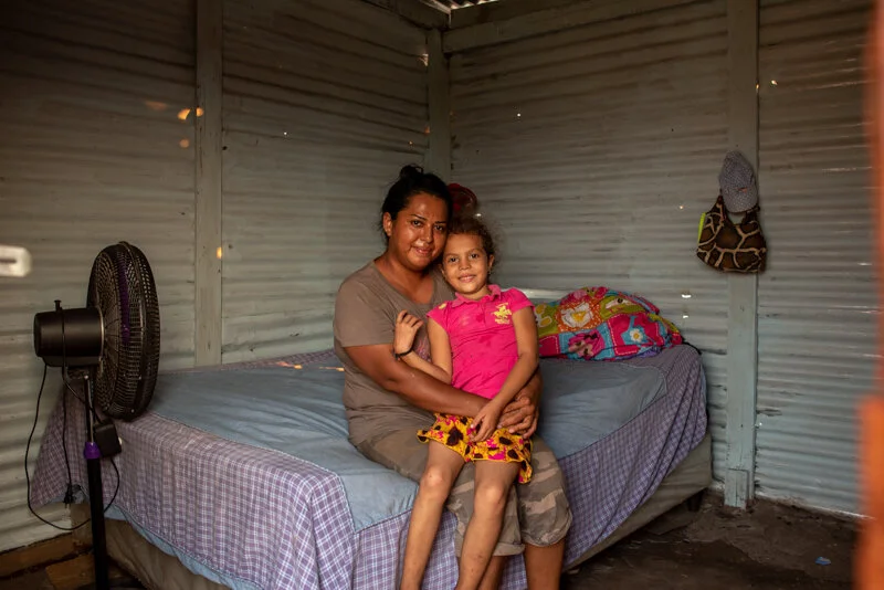  El Carmen is one of the poorest sections of San Pedro Sula. Ballos Horizantes is a community of people who claim small plots of land owned by the municipality. By law, if they prove occupancy for 10 years they gain ownership. In this community and t