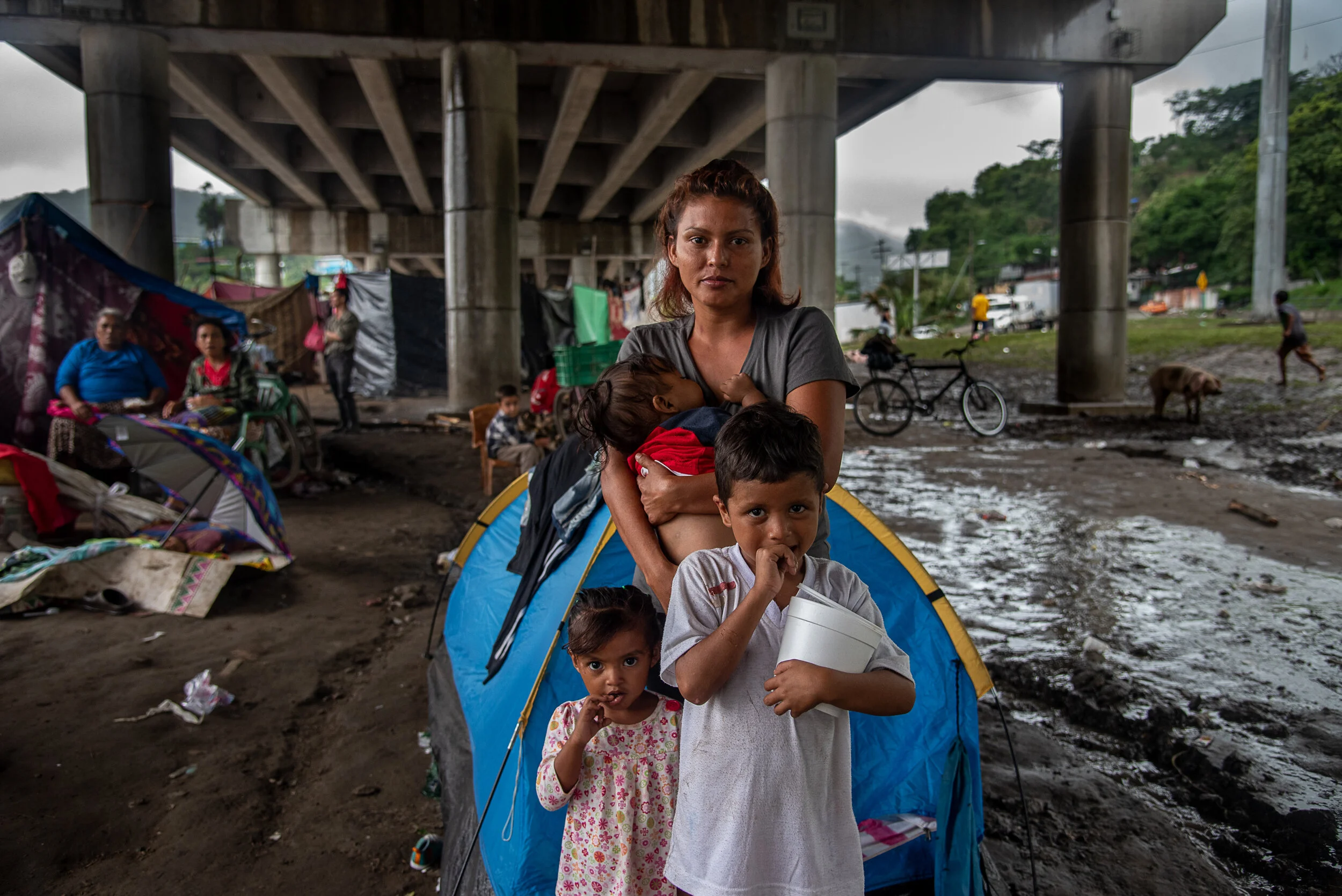  Ingrid Rodriguez, 27; Daniel Rodriguez, 10 months; Kendra, 3; Kenneth, 6   Ingrid Rodriguez and her three children have been displaced after hurricanes Eta and Iota and now sleep together in a small one-person tent in a camp of newly homeless Hondur