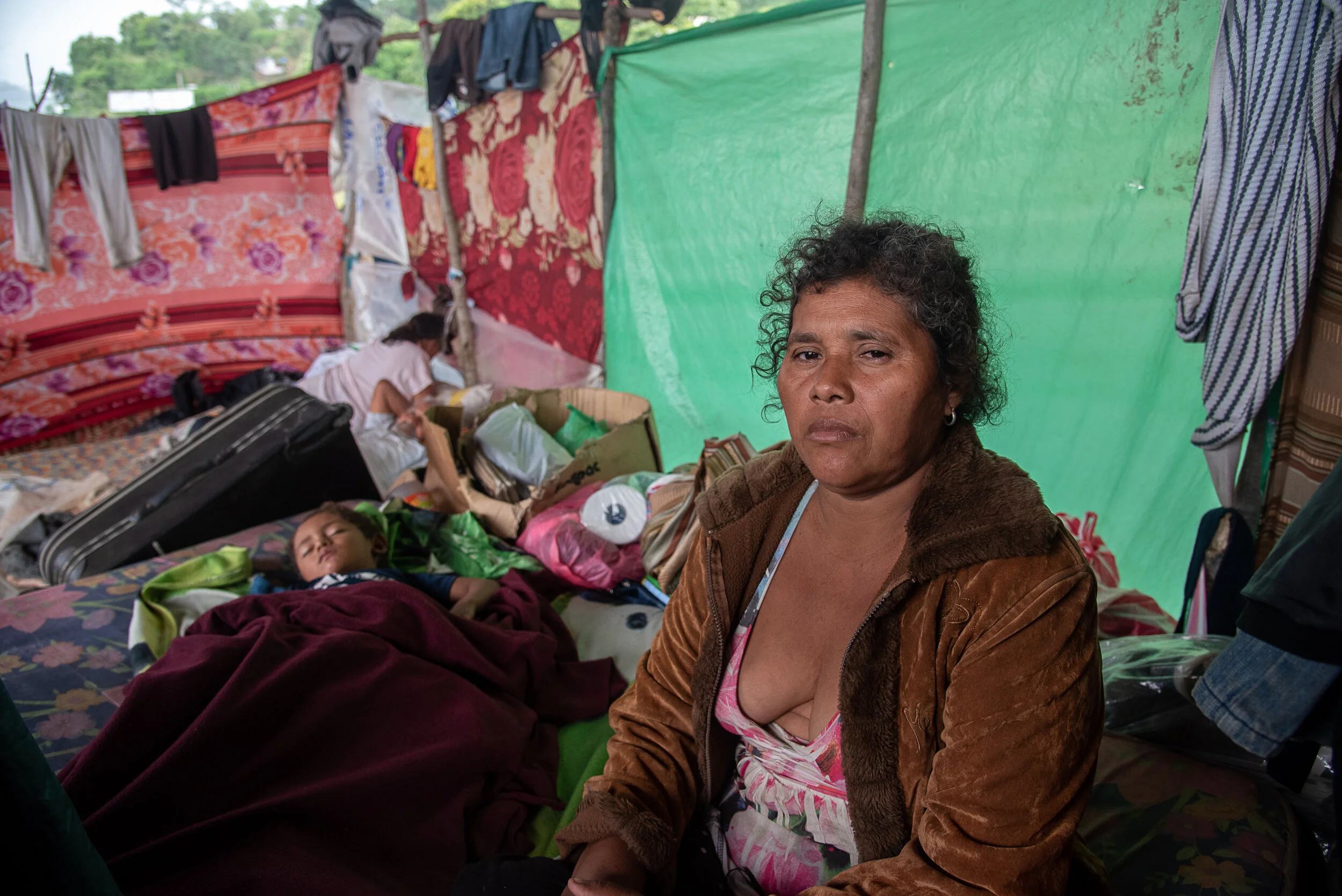  Digna Castro, 50, Avi Jared 3   Digna Castro has been separated from her family in the aftermath of two hurricanes and is now taking care of her grandson, Avi, who is sick with a fever. Digna is unable to get medicine because she has no money. Her h