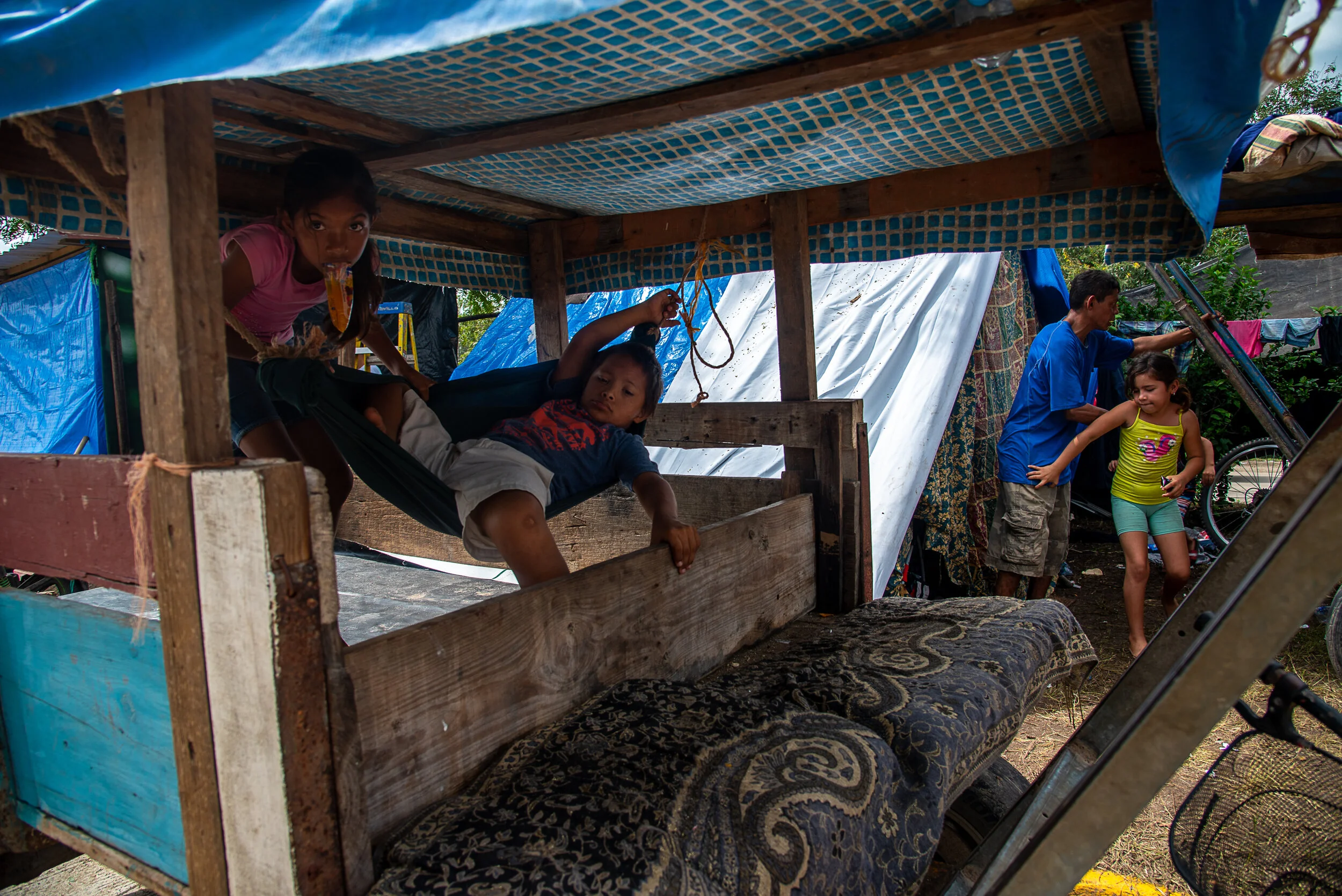  A makeshift refugee camp has taken over the median and one lane of the major highway in San Pedro Sula, Honduras, where the worst of the flooding from Huricane Eta has affected nearly 2 million people. The Honduran governemnt lacks the resources and