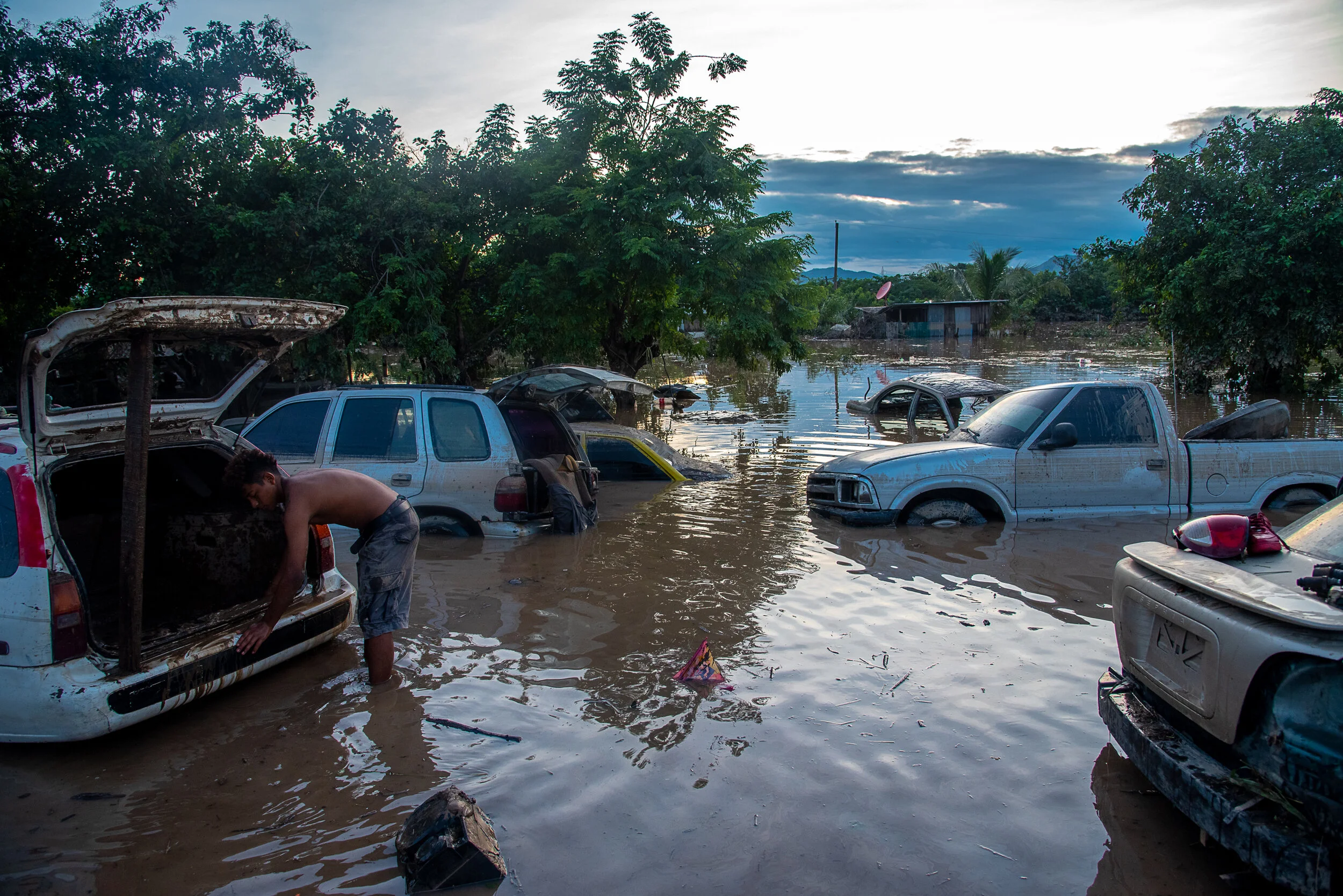  Flooded cars along a highway next to La Lima, the hardest hit community. 