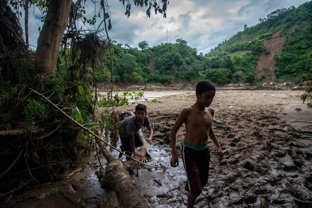  A massive mudslide fell into the flooded Chemelecon River in San Pedro Sula, Honduras after days of rain in the wake of Hurricane Eta. Flooding in the aftermath of Hurricane Eta has displaced hundreds of thousands in Honduras. There are many missing