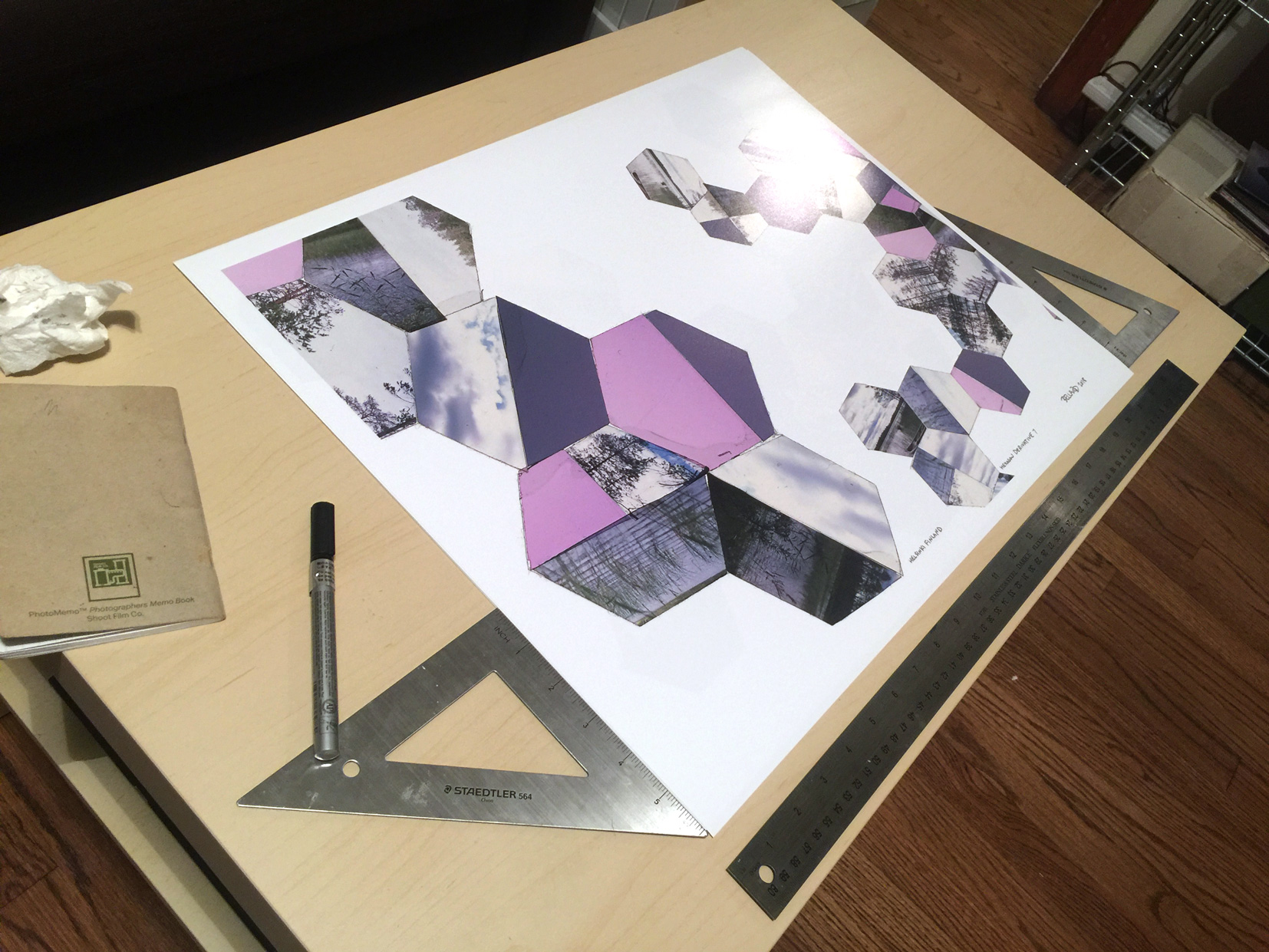 Signing and framing the prints.