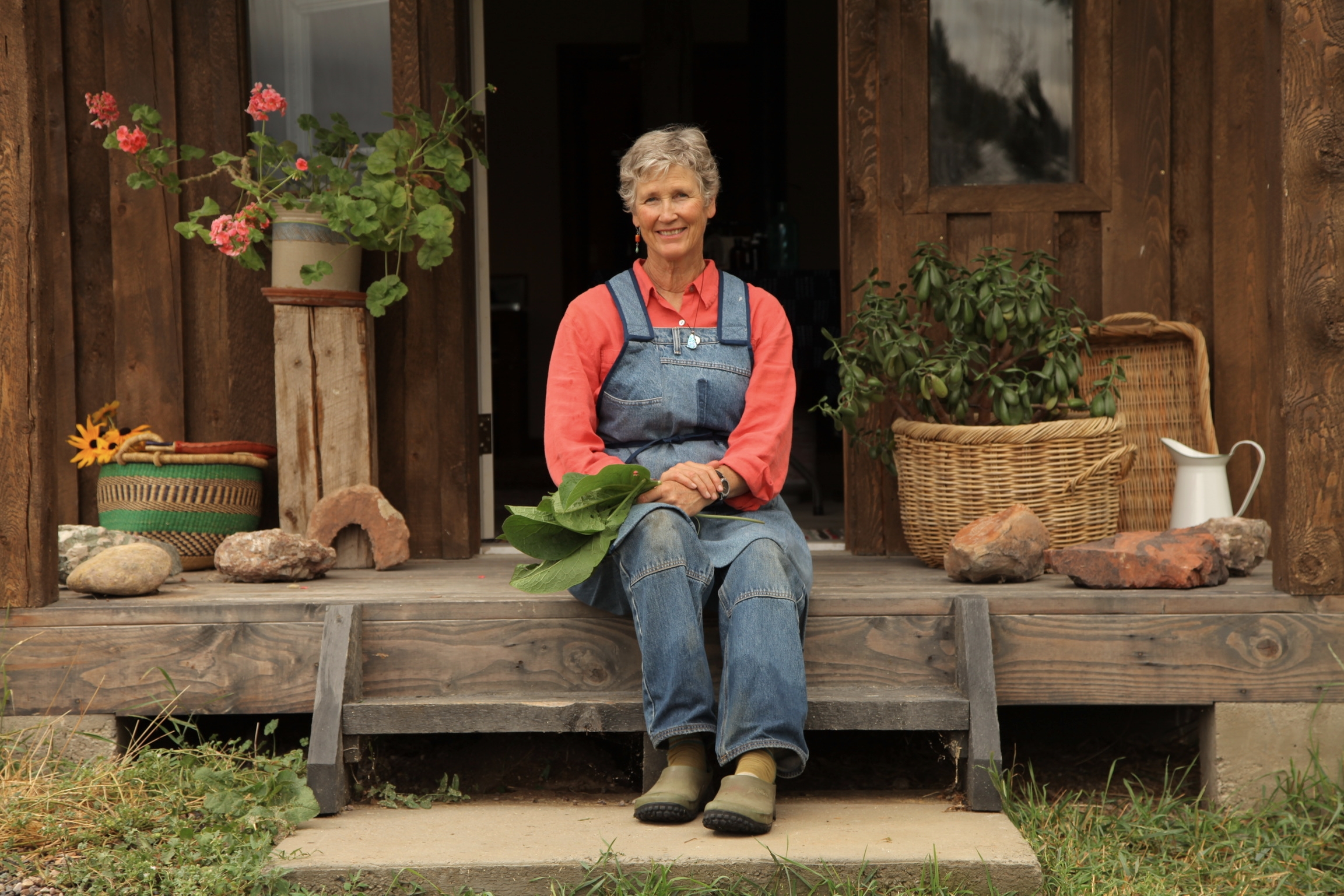 Lee Bennion on the steps of her workshop. Photo by Steve Olpin