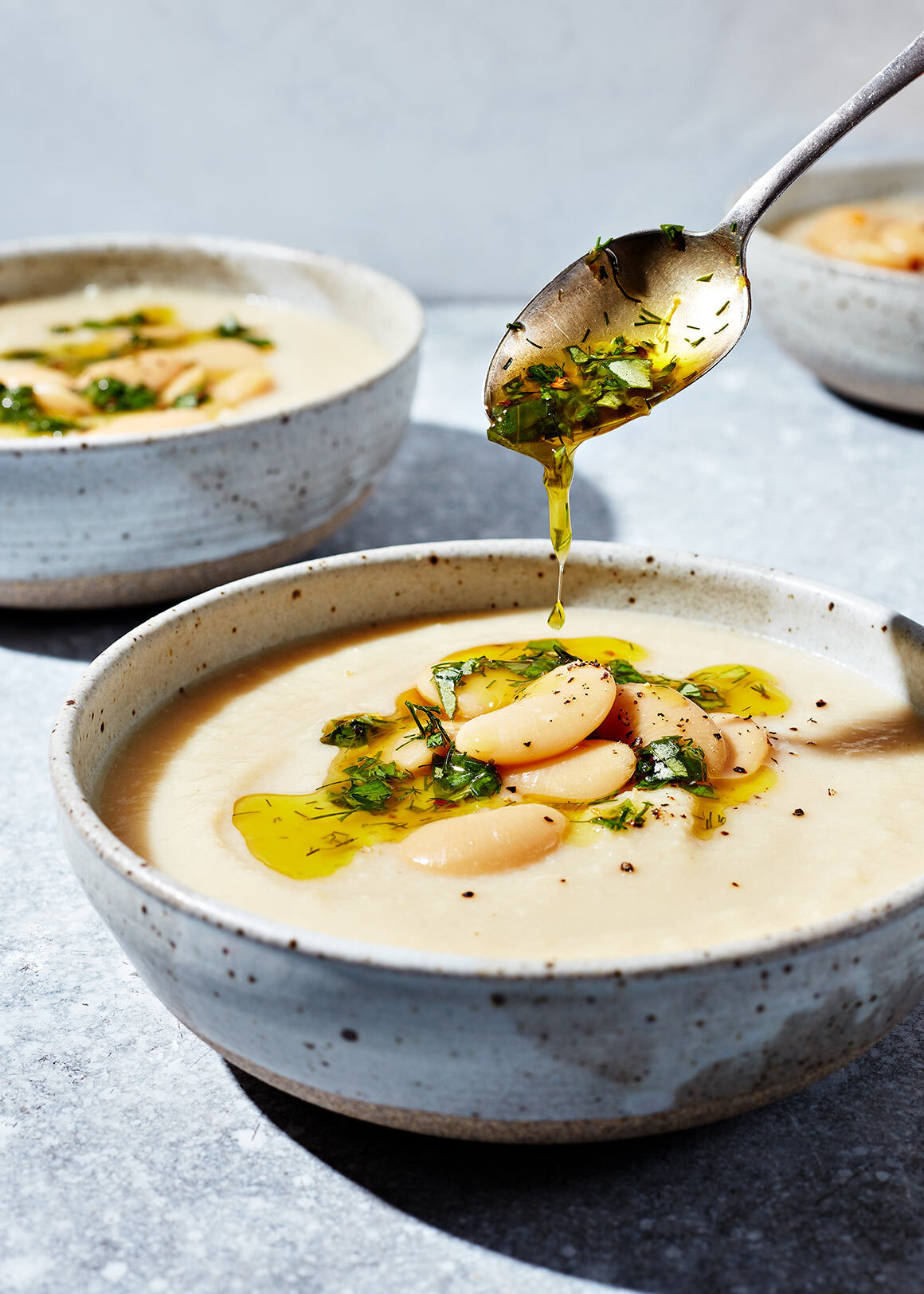 Food-between-freinds-jesse-tyler-ferguson-recipes-cookbook-food-photography-ButterBean-Soup-cauliflower-herb-pistou.jpg