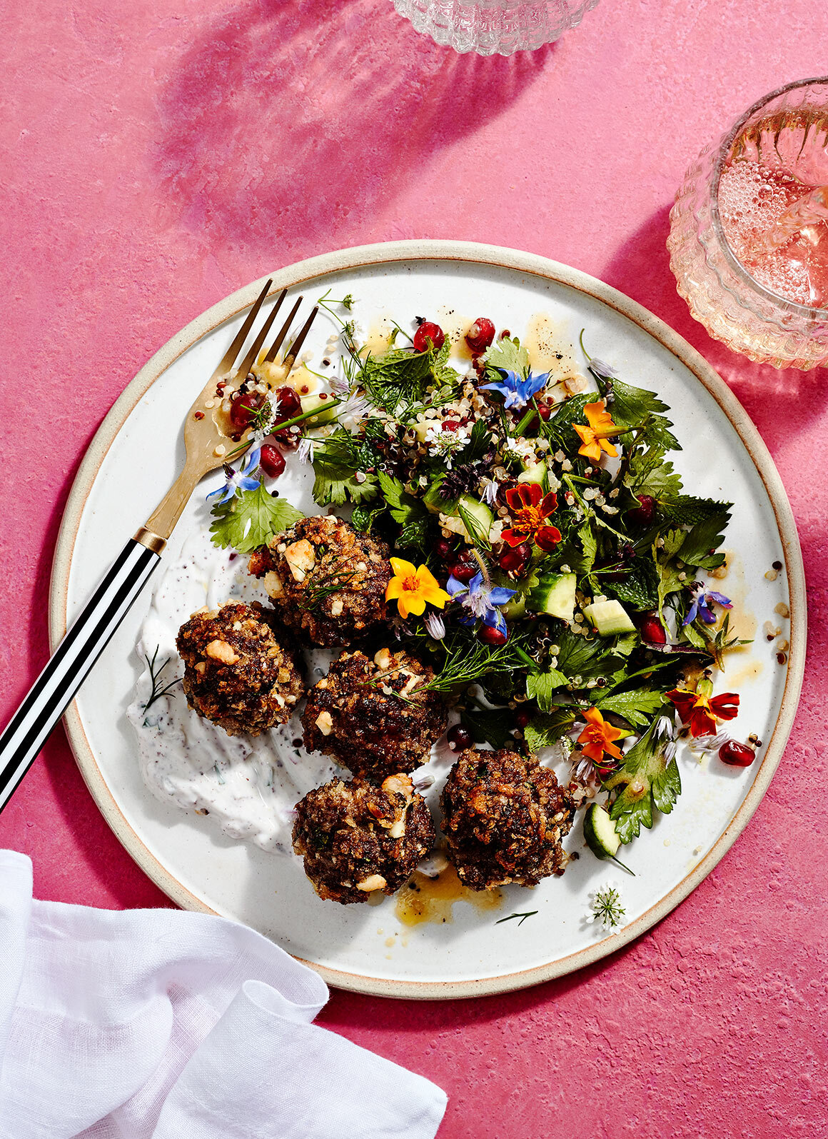 Food-between-freinds-jesse-tyler-ferguson-recipes-cookbook-food-photography-Lamb-Meatballs-edible-flowers-spiced-yogurt-herb-salad-52625.jpg