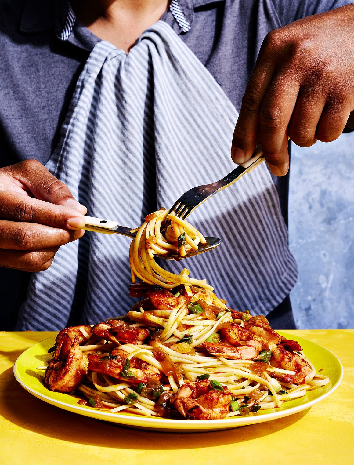 Shaquille-Oneal-eating-Shrimp-Linguine-family-style-cookbook.jpg