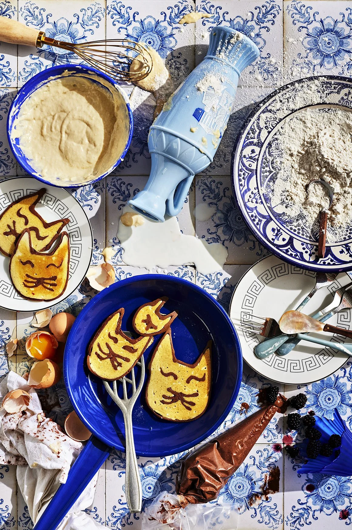 Lore-Olympus-cookbook-photogrphy-Poseidons-Kitty-shapped-Pancakes-kitchen-mess.jpg
