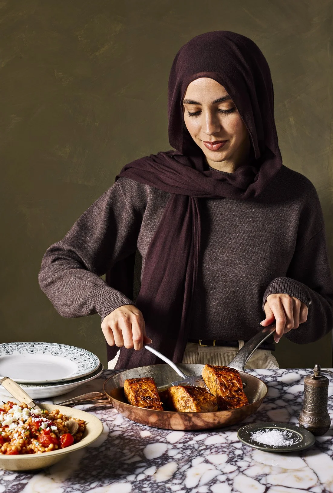 hajar-larbah-serving-mediterranean-salmon-couscous.jpg