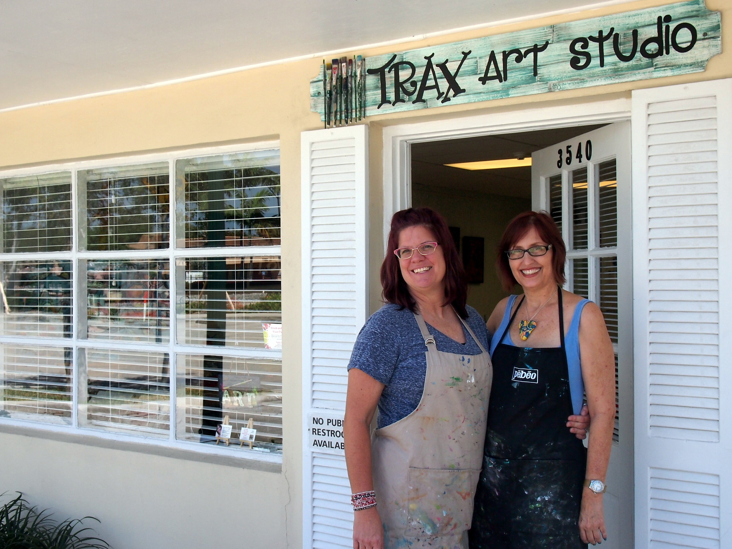 Artists Heather Neiman and Tristina Dietz Elmes in front of the new Trax Art Studios.