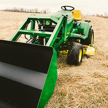 Little Buck Loader on a tractor