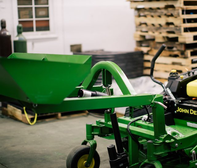 Image of Zero-turn lawn tractor with loader