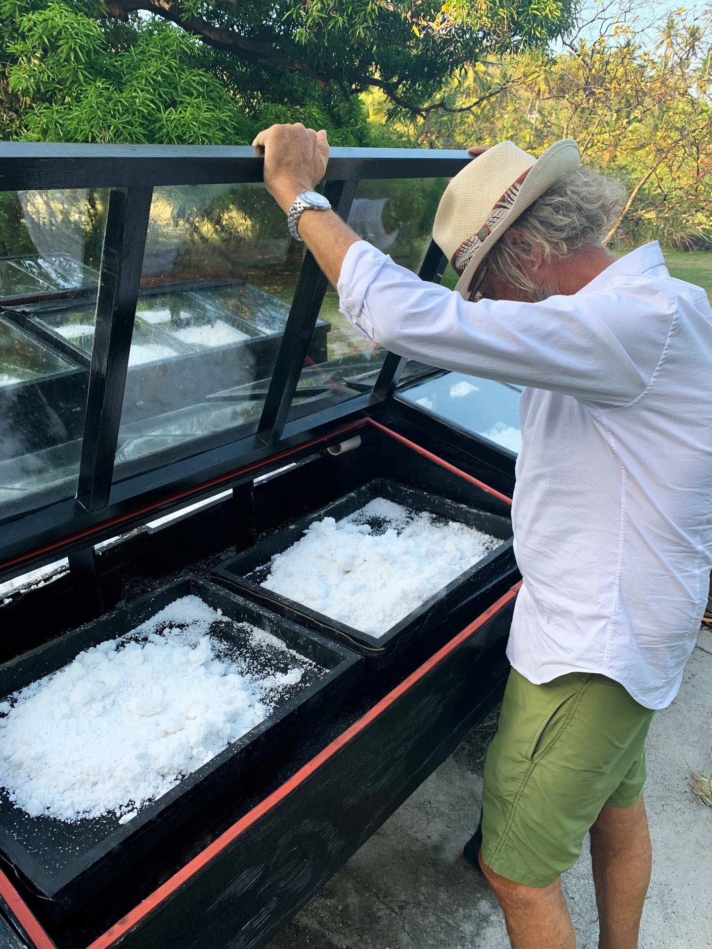 Jerry examining solar evaporated sea salt