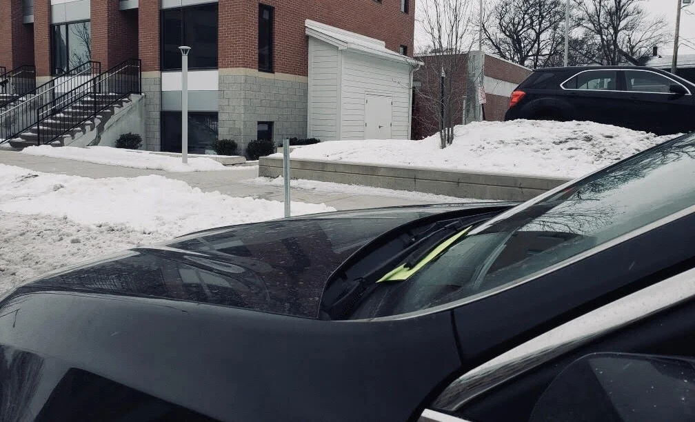 Photo evidence of Tiffany’s recent experience parking in Grand Rapids.
