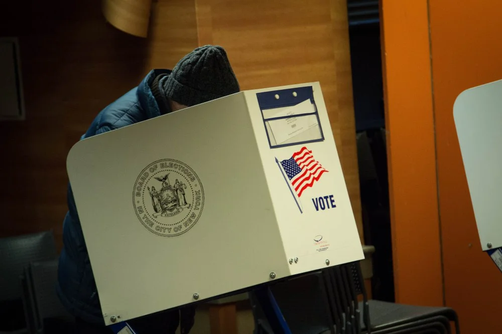 Election Day 2012: A man casts his vote at a polling station. 