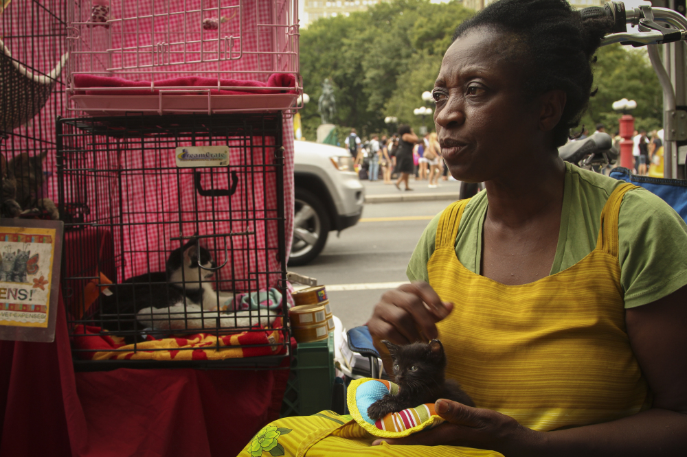  Aug. 22, 2012: Patricia runs a shelter for homeless animals called "Hope for Kitties inc." and holds adoption events in Union Square. 