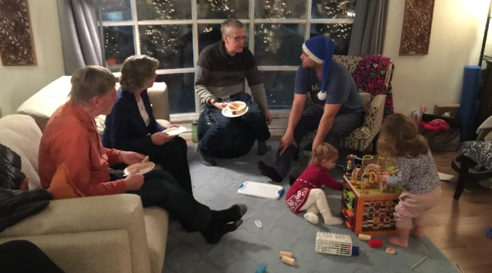 Some friends enjoying food and conversation at our December Christmas gathering.
