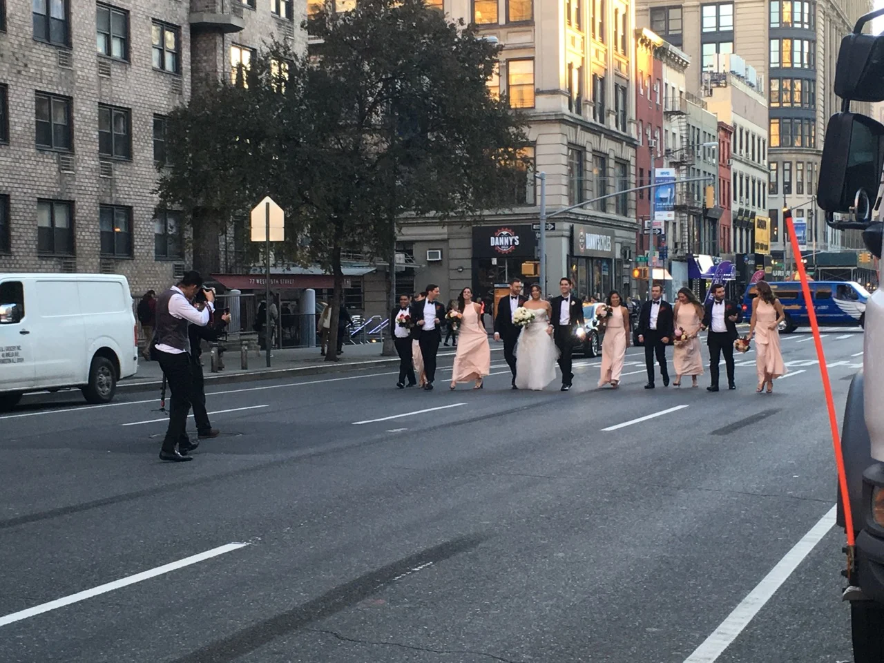 Wedding Photog Hard at Work on 6th.jpg