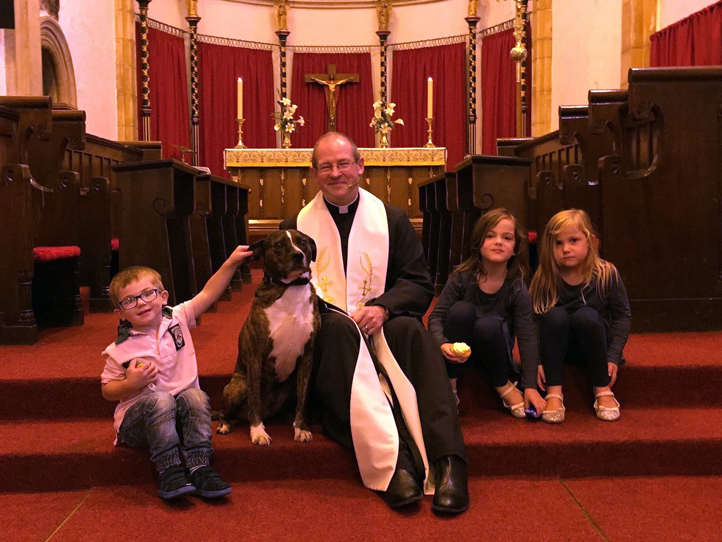 Fr Mark and Calib with Sebastian, Isabella and Sophia Heritage-Eynon
