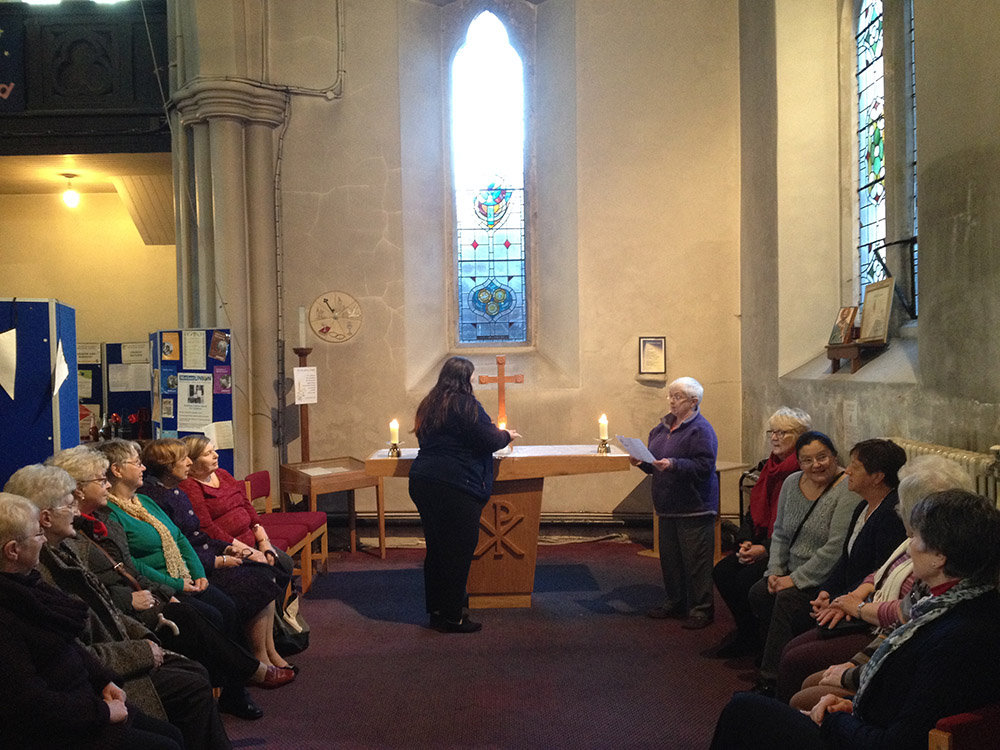 Lighting a candle to remember those affected by gender-based violence
