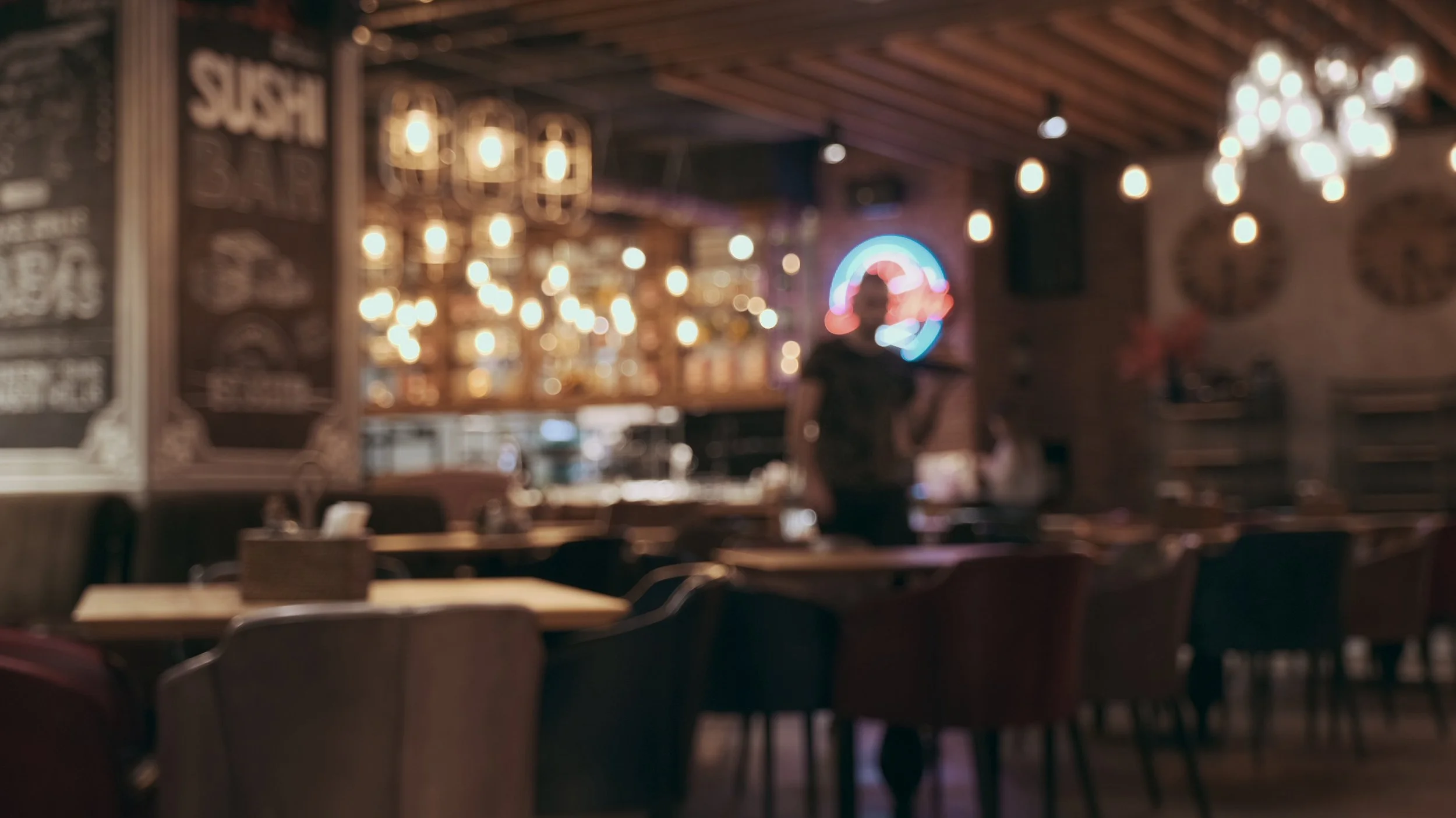 blurred-interior-large-restaurant-with-bright-lighting-the-waiter-comes-to-cook-and-pi-SBI-350087827.jpg