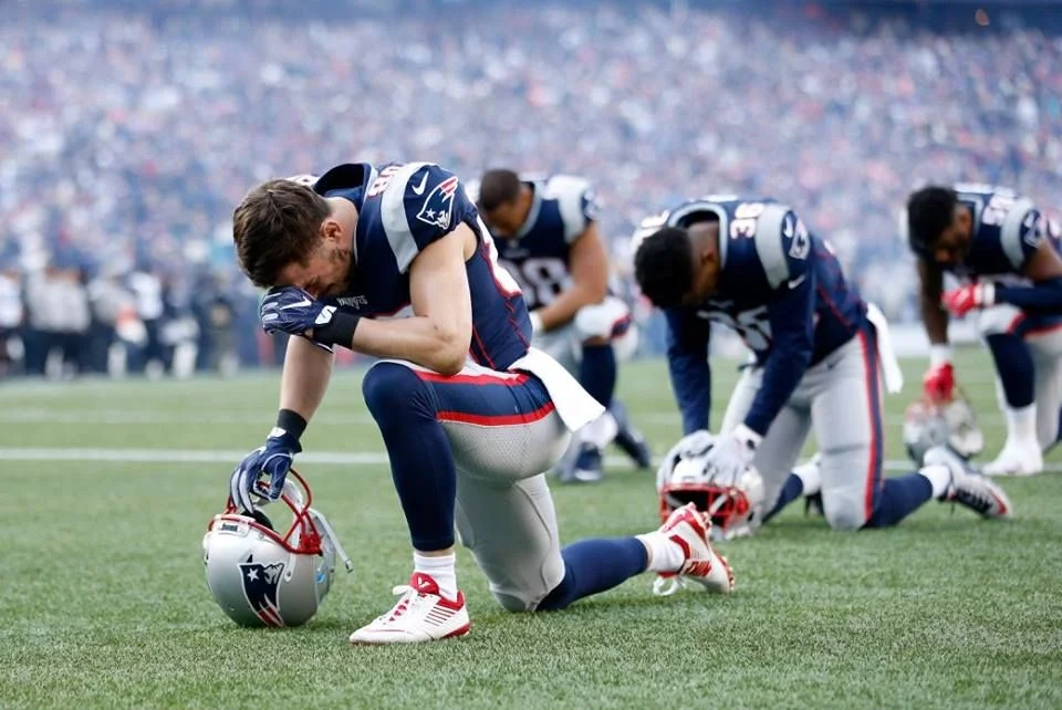 players praying.jpg